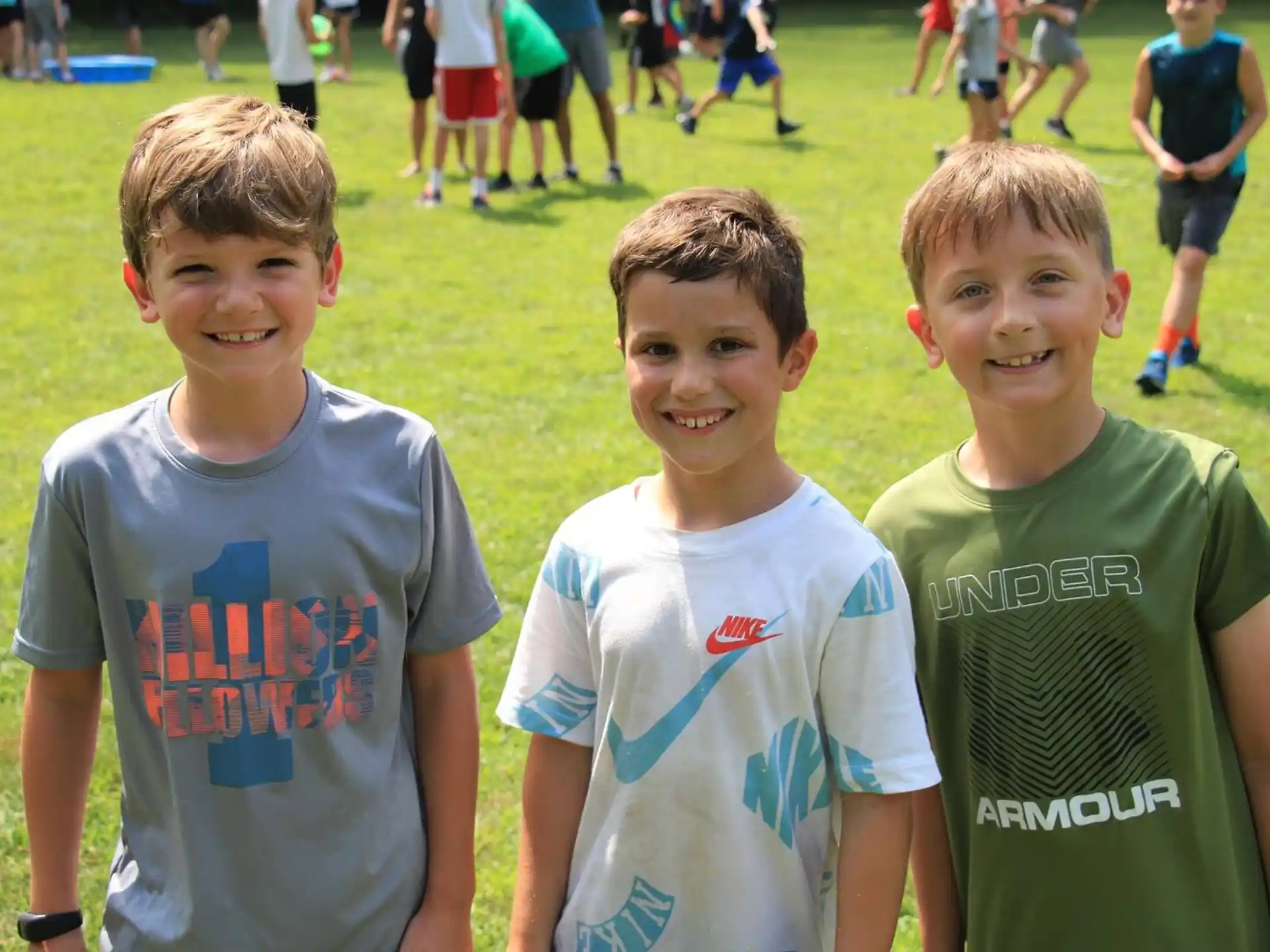a group of boys posing for a picture