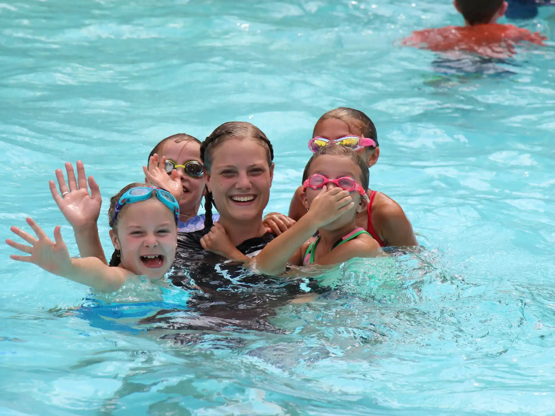 a group of people in a pool