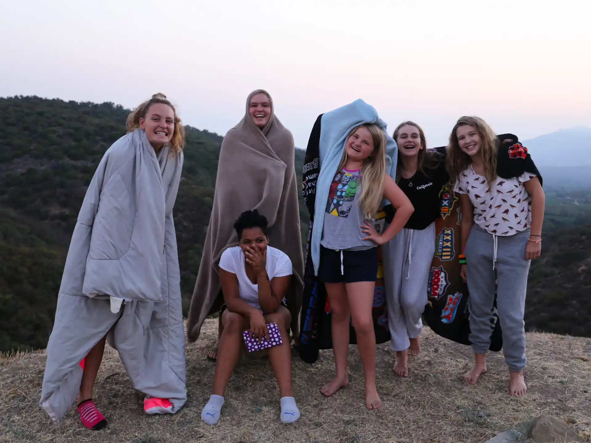 a group of people posing for a photo