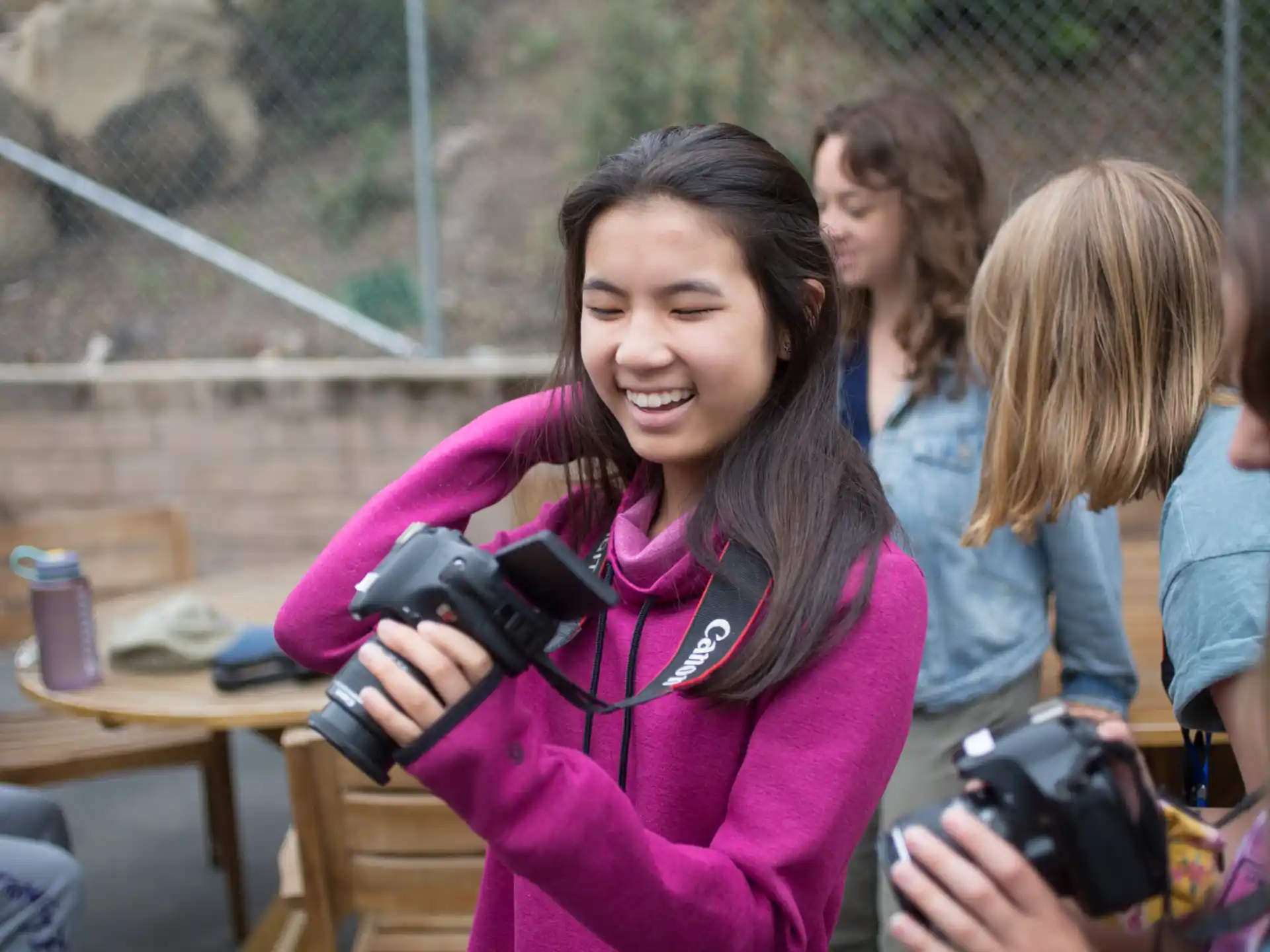 a person holding a camera