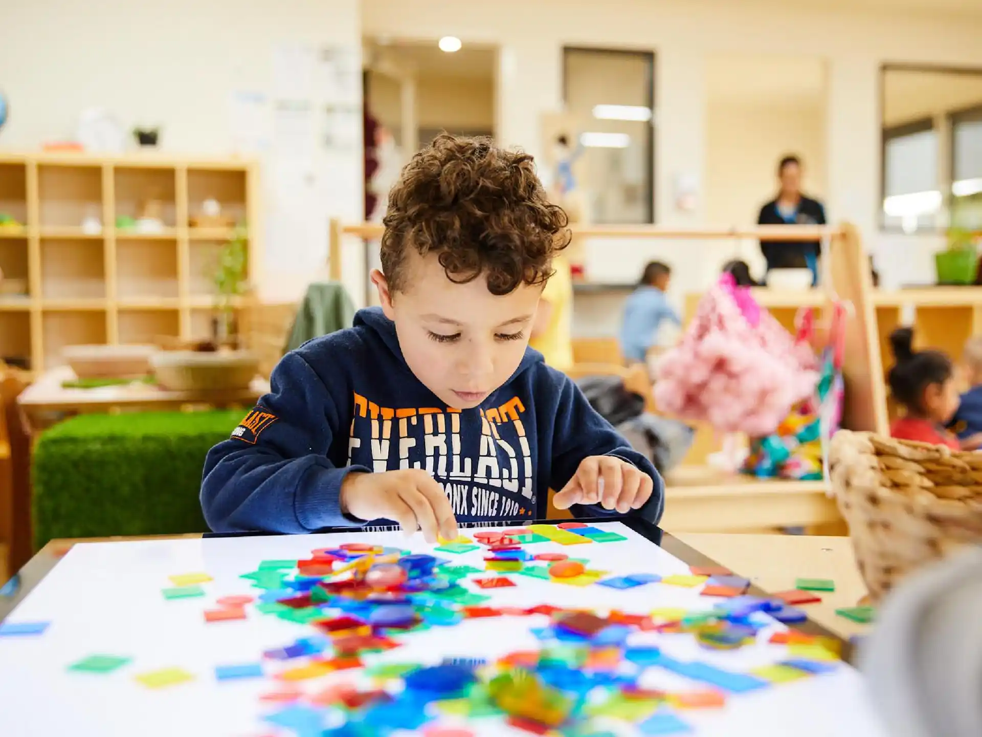 a child sitting at a table