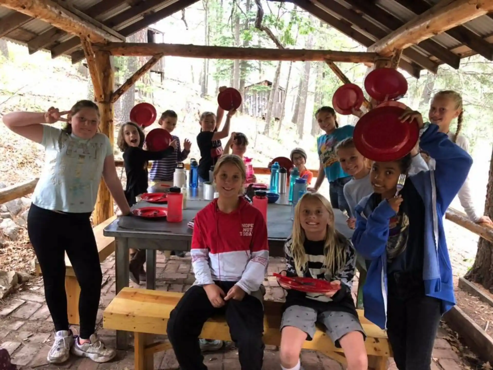 a group of children in a tent