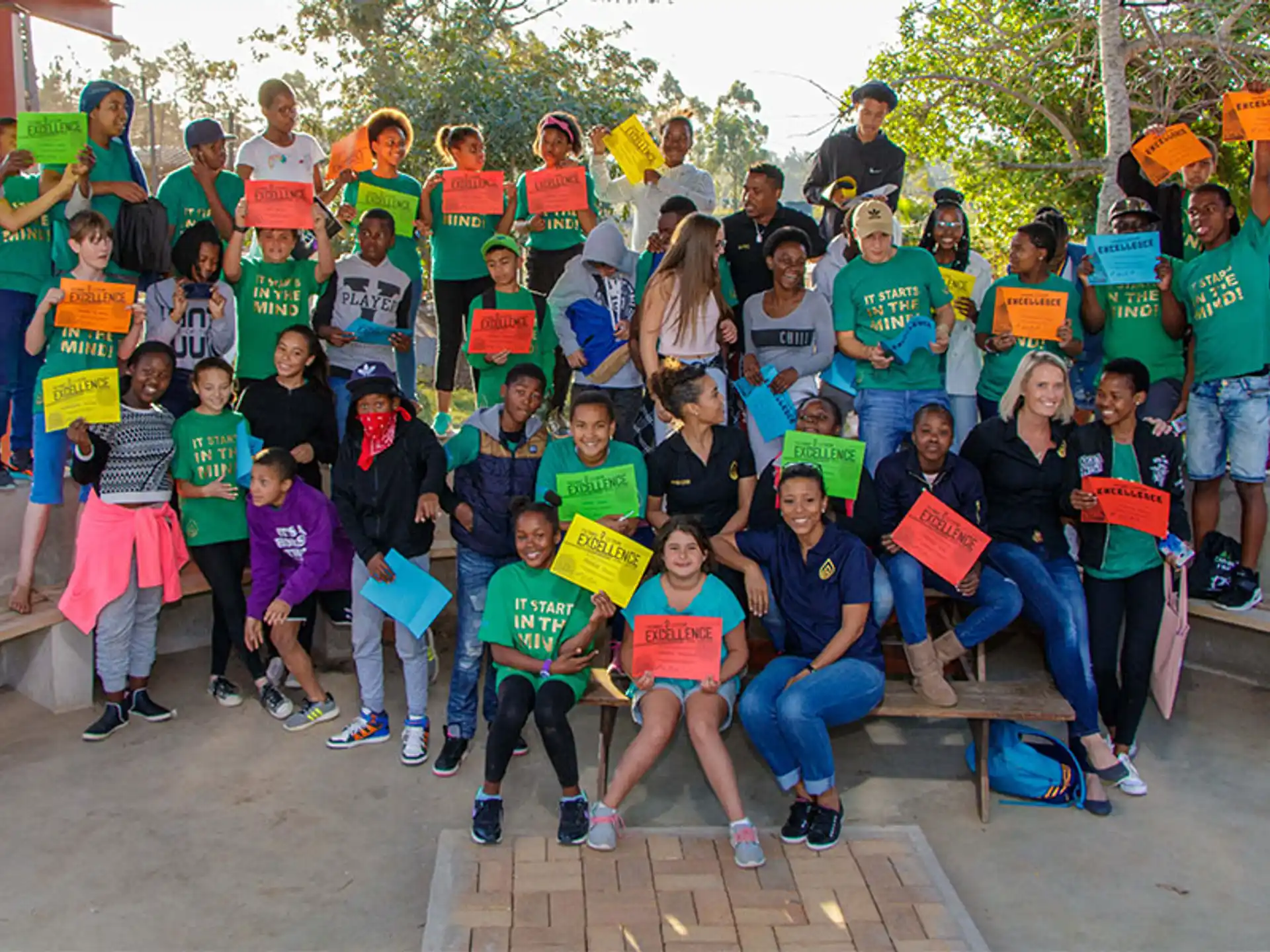 a group of people posing for a photo