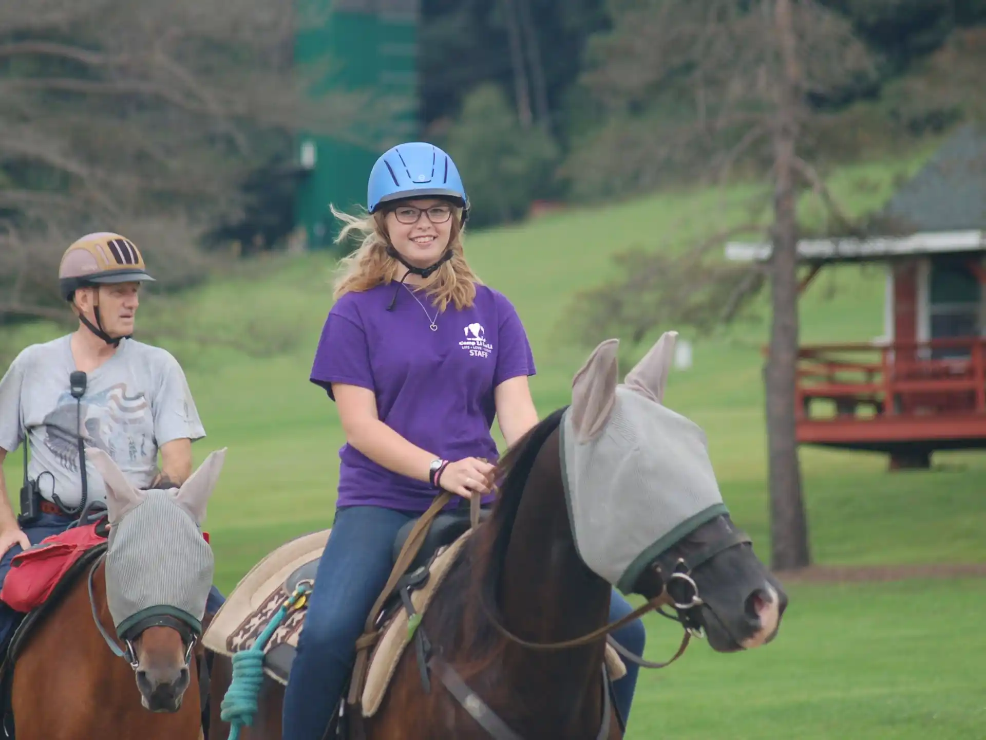 a couple of people ride horses