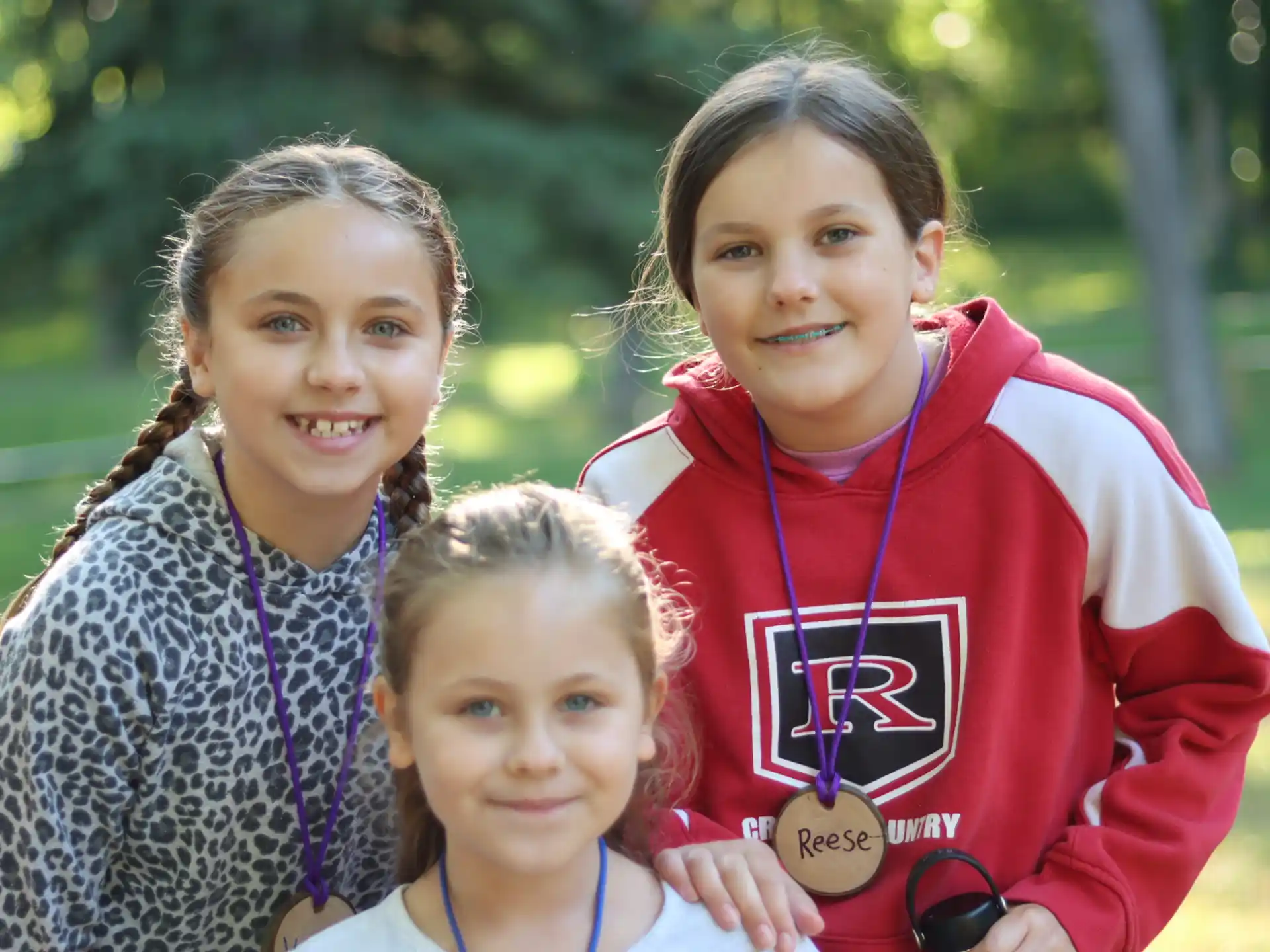 a group of girls posing for a photo