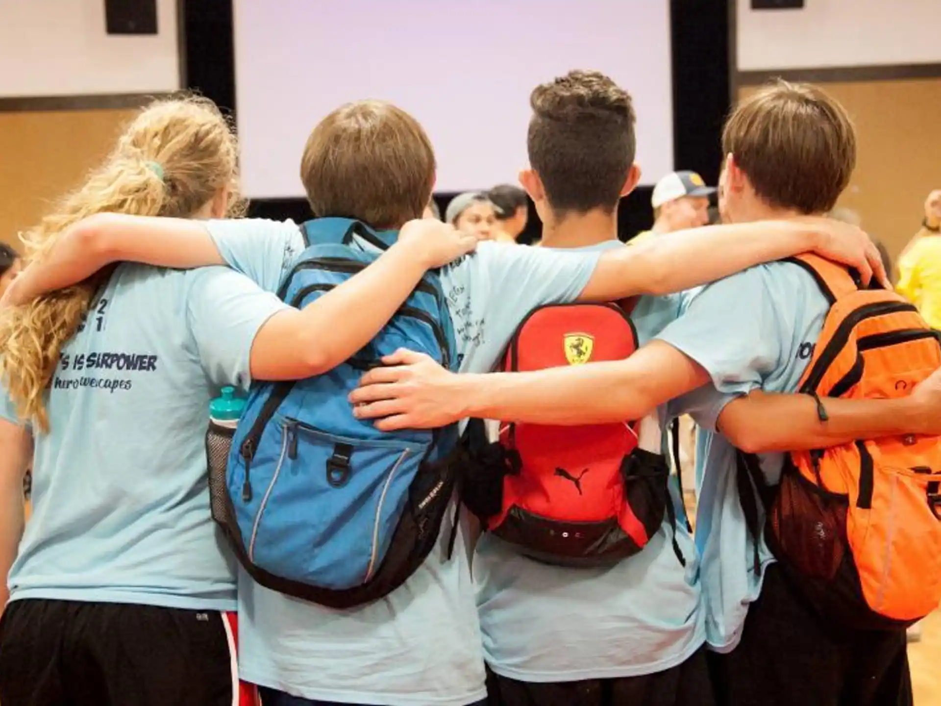 a group of people hugging