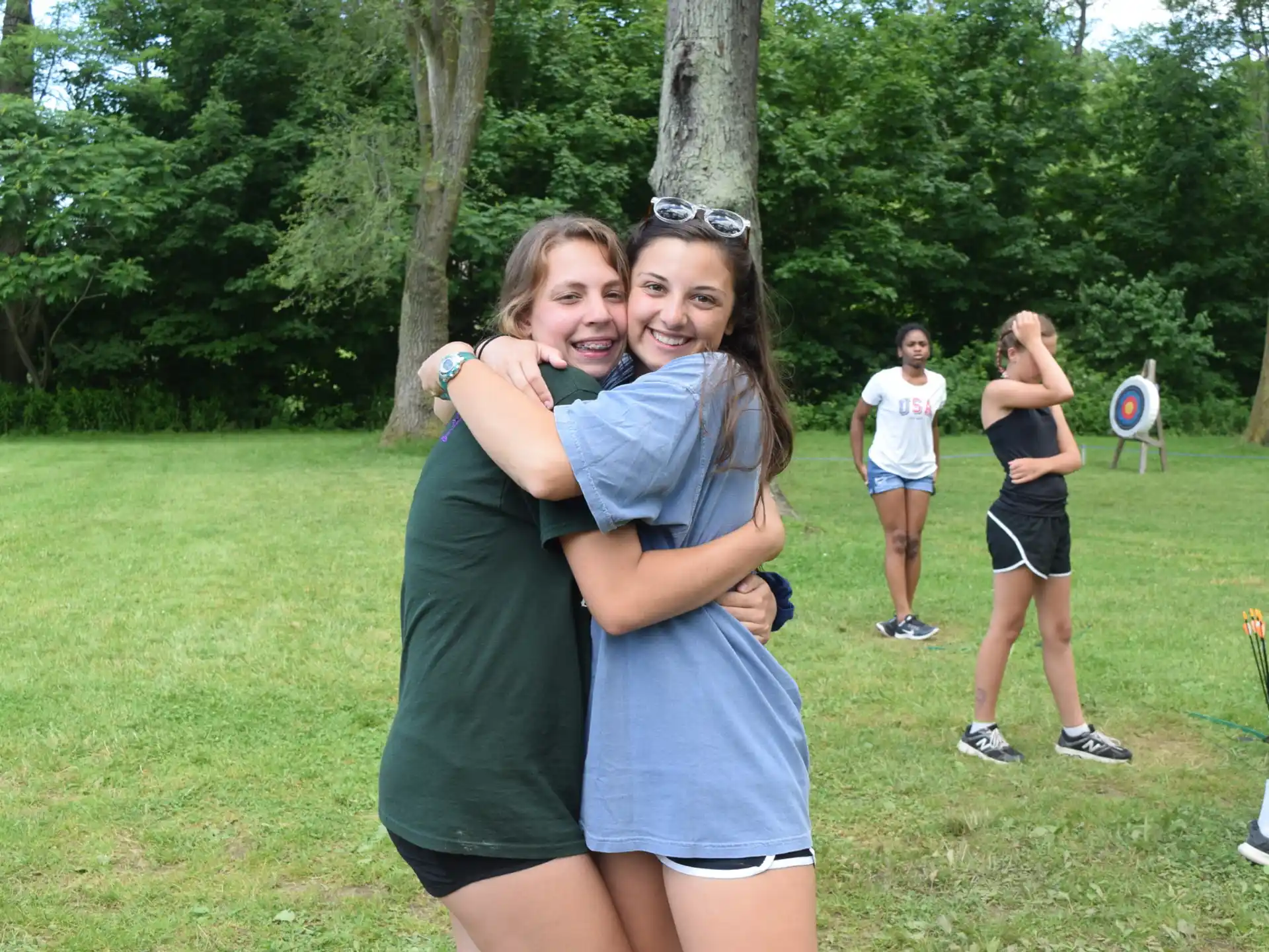 a couple of girls posing for a picture