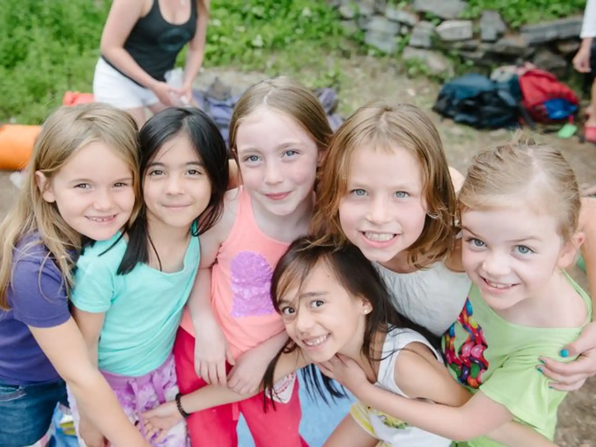a group of girls posing for a photo