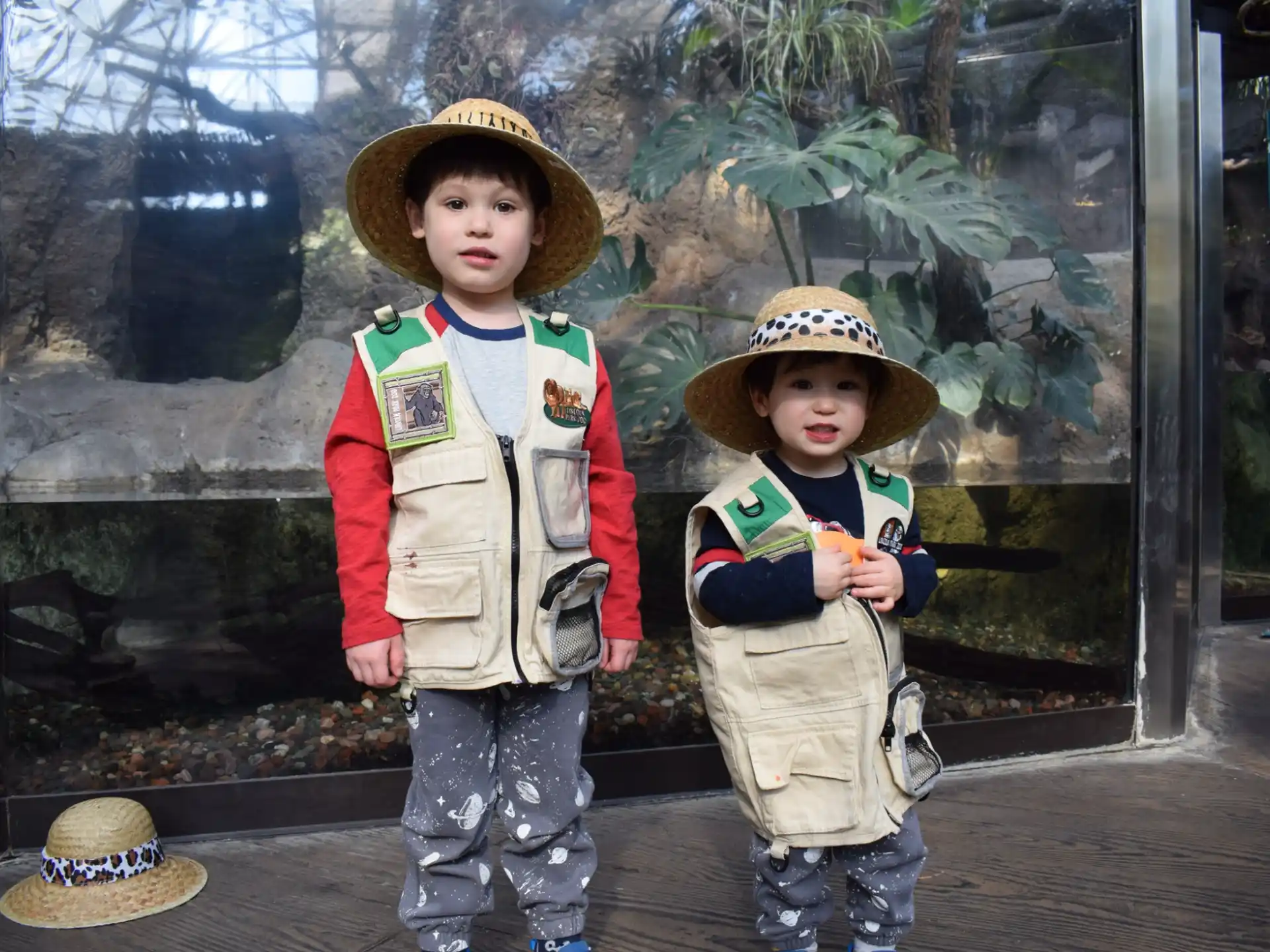 two children wearing hats