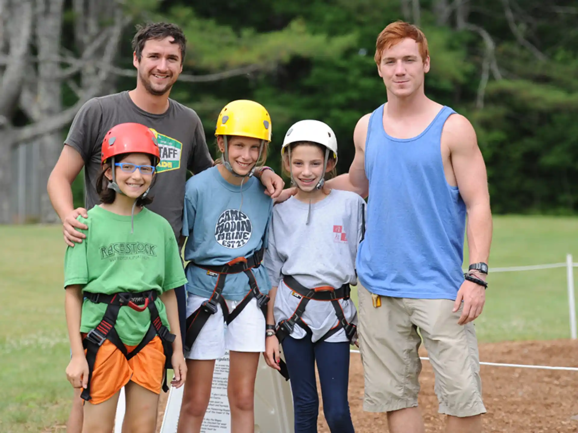 a group of people wearing helmets