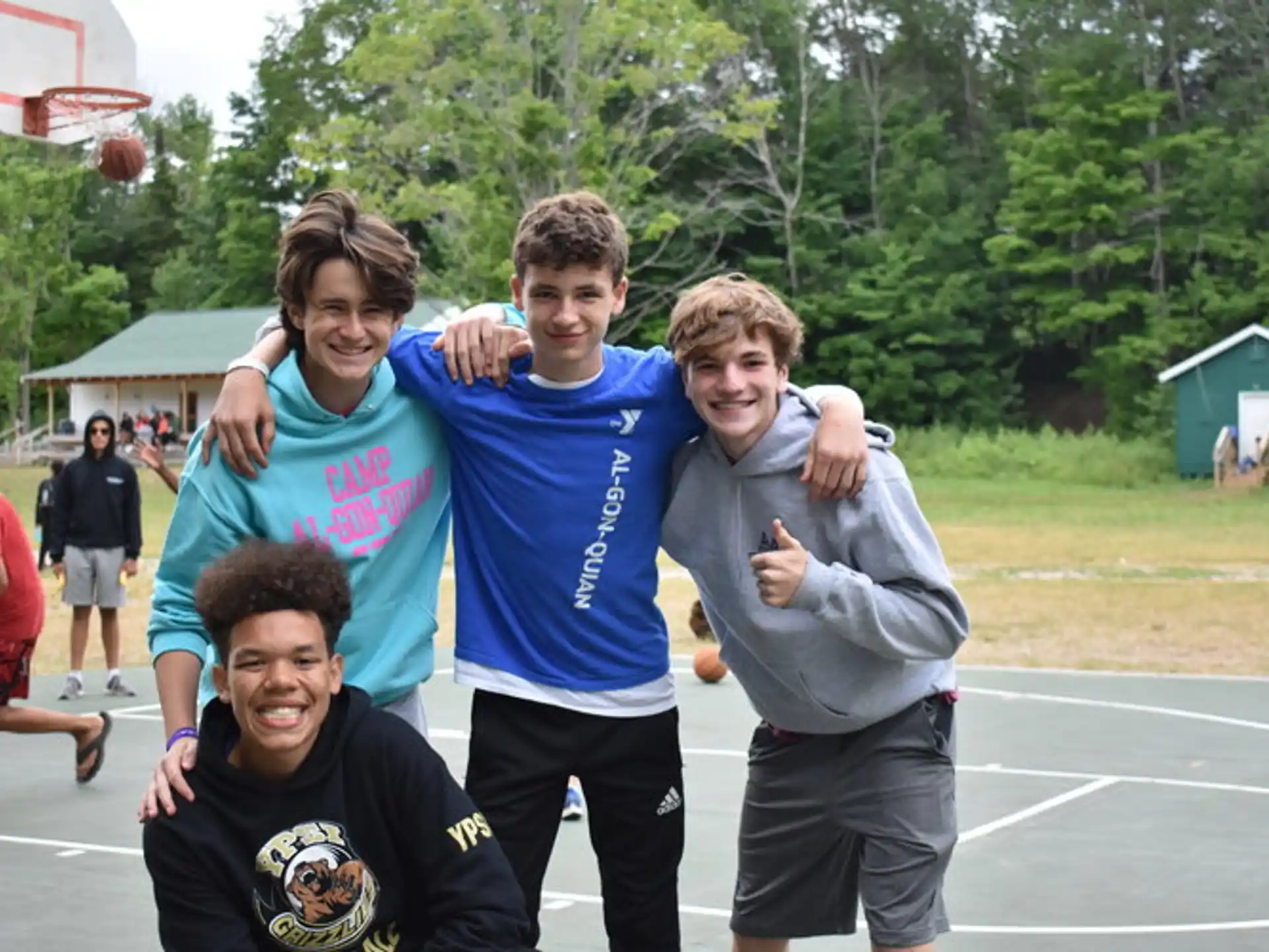 a group of people running on a court