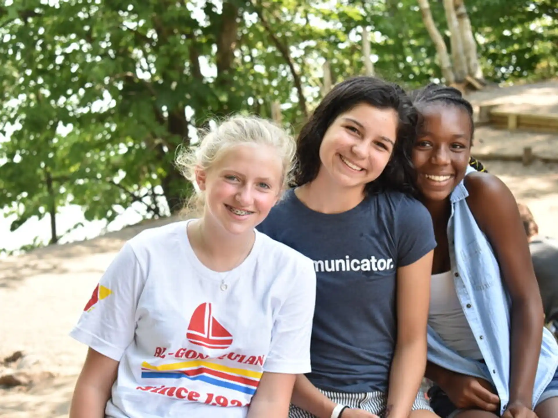 a group of women smiling