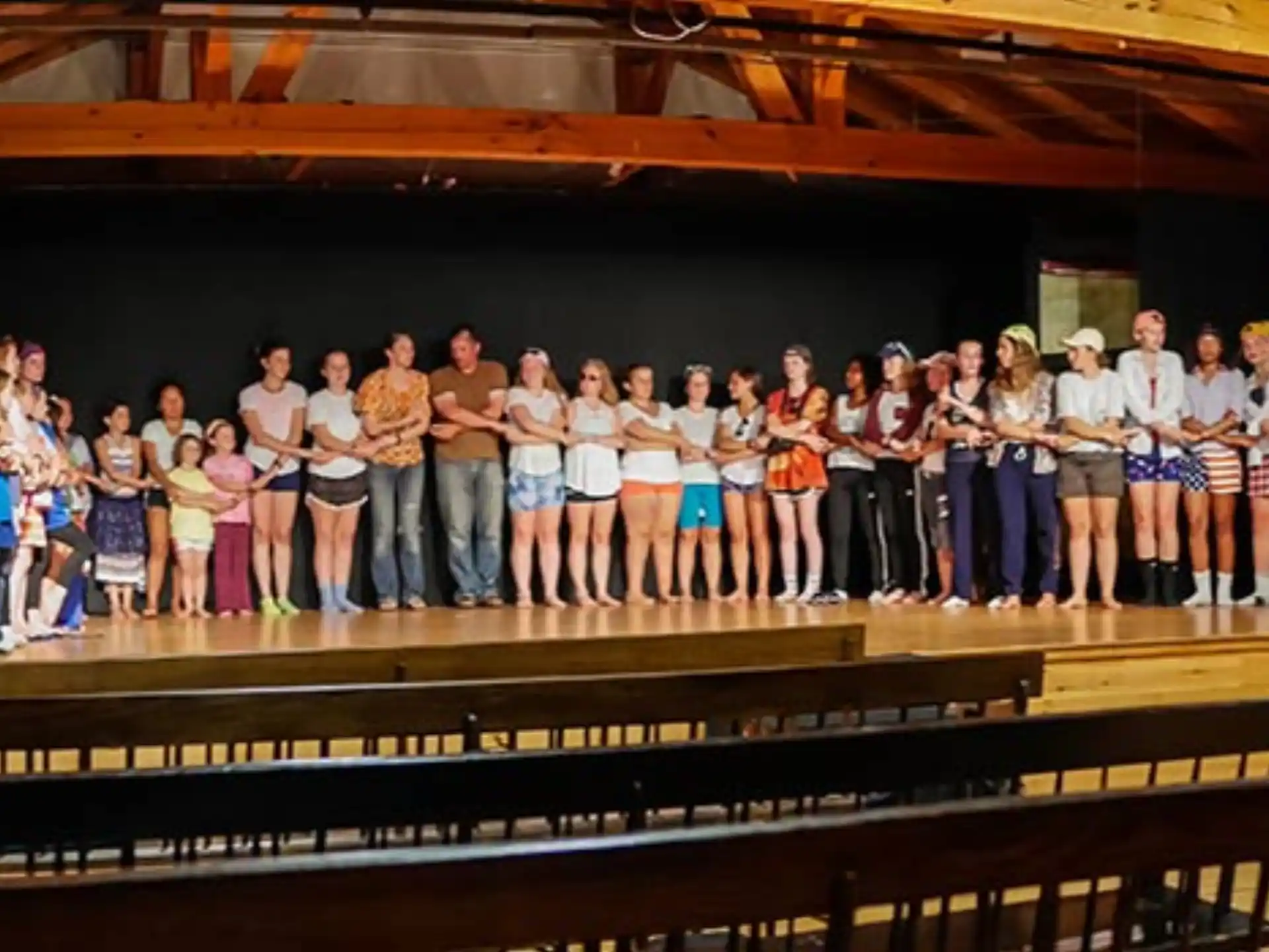 a group of people standing in a room