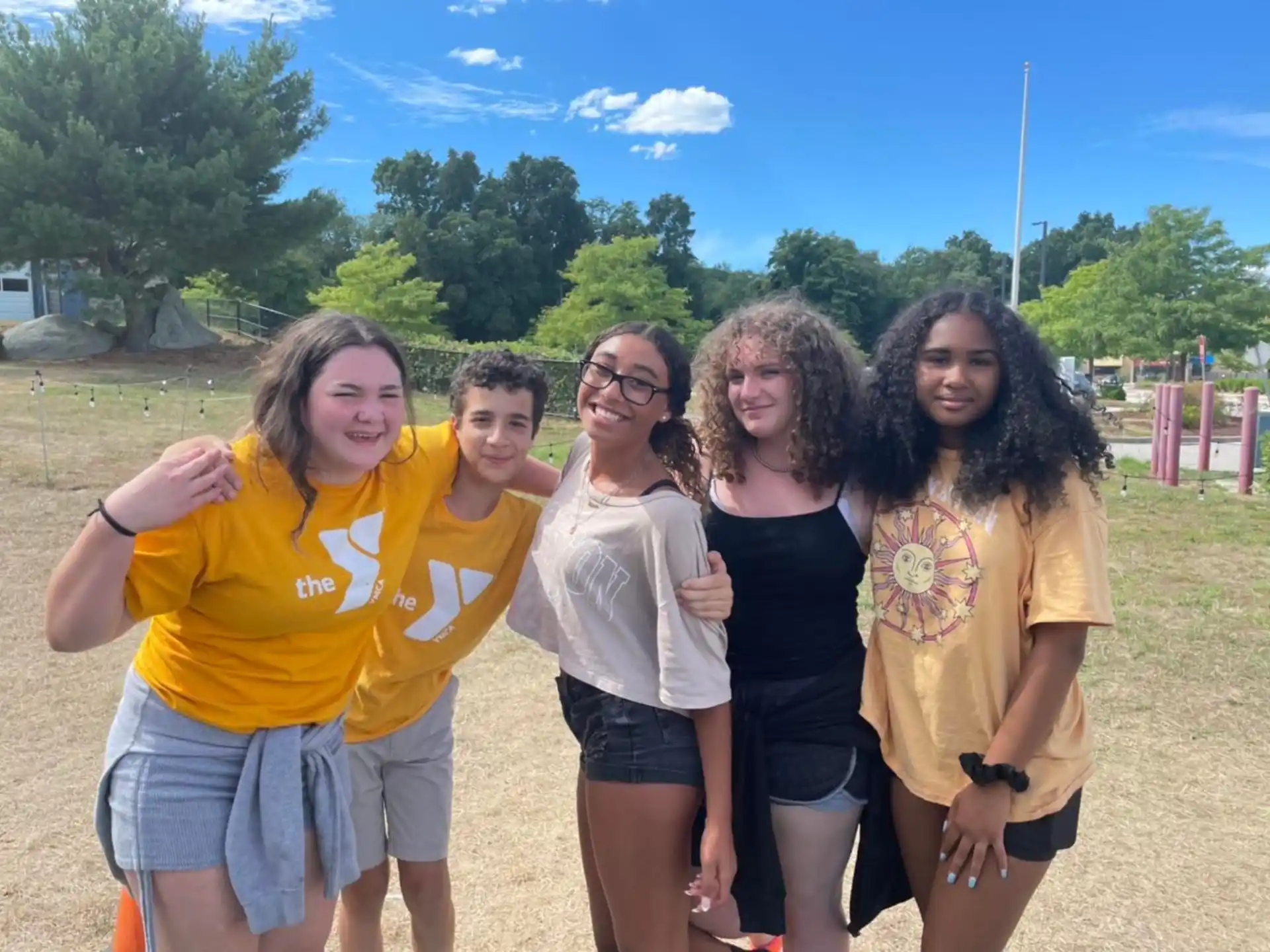 a group of people posing for a photo