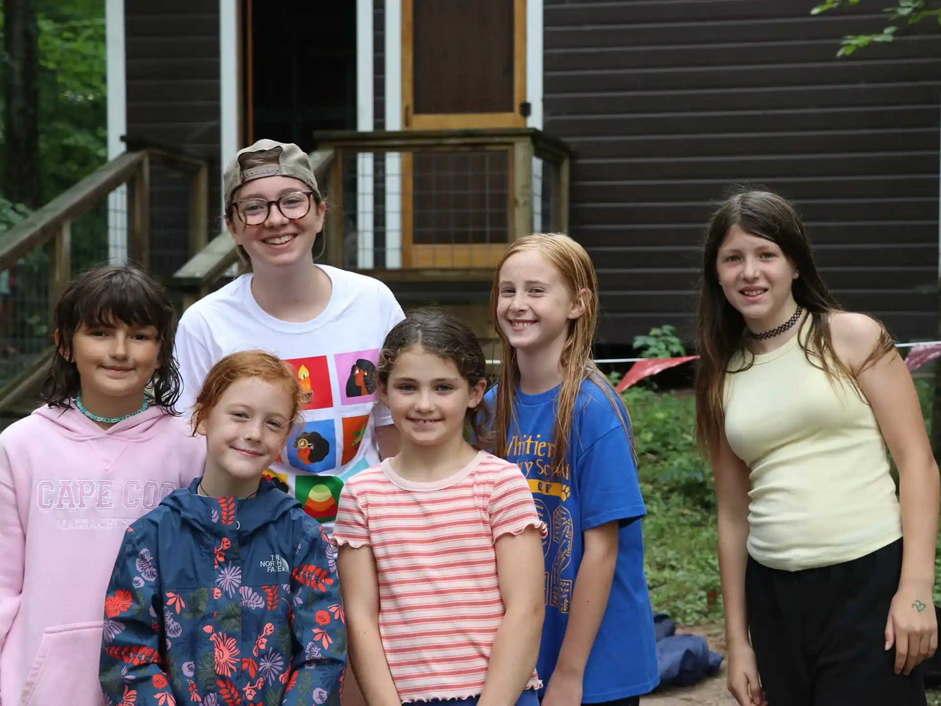 a group of people posing for a photo