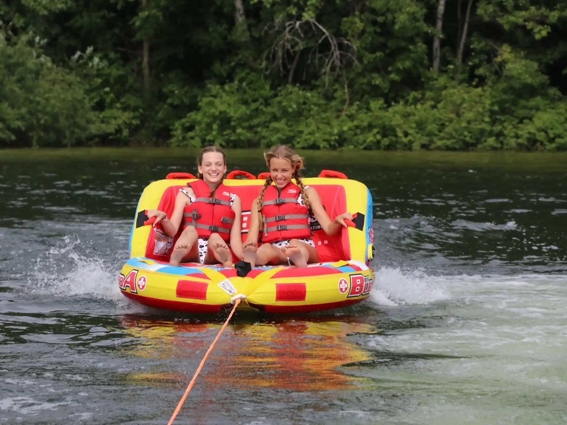 two children on a raft