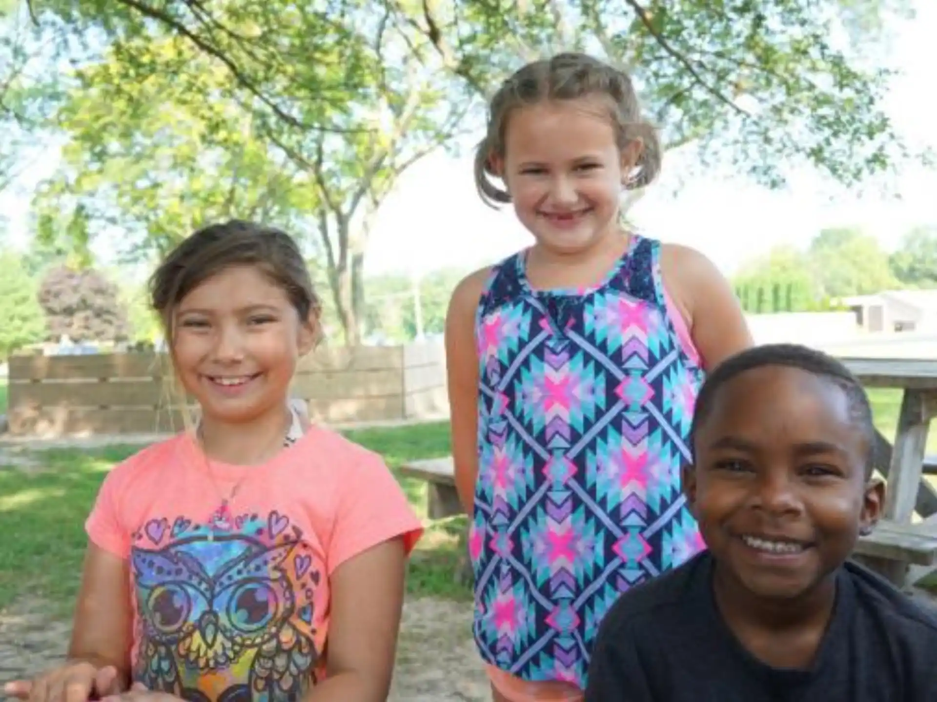 a group of children smiling