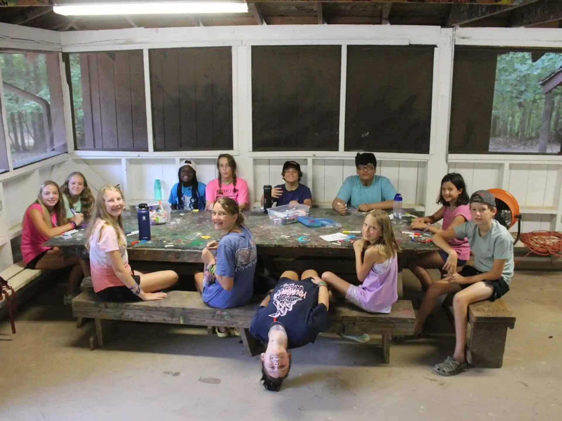 a group of people sitting at a table