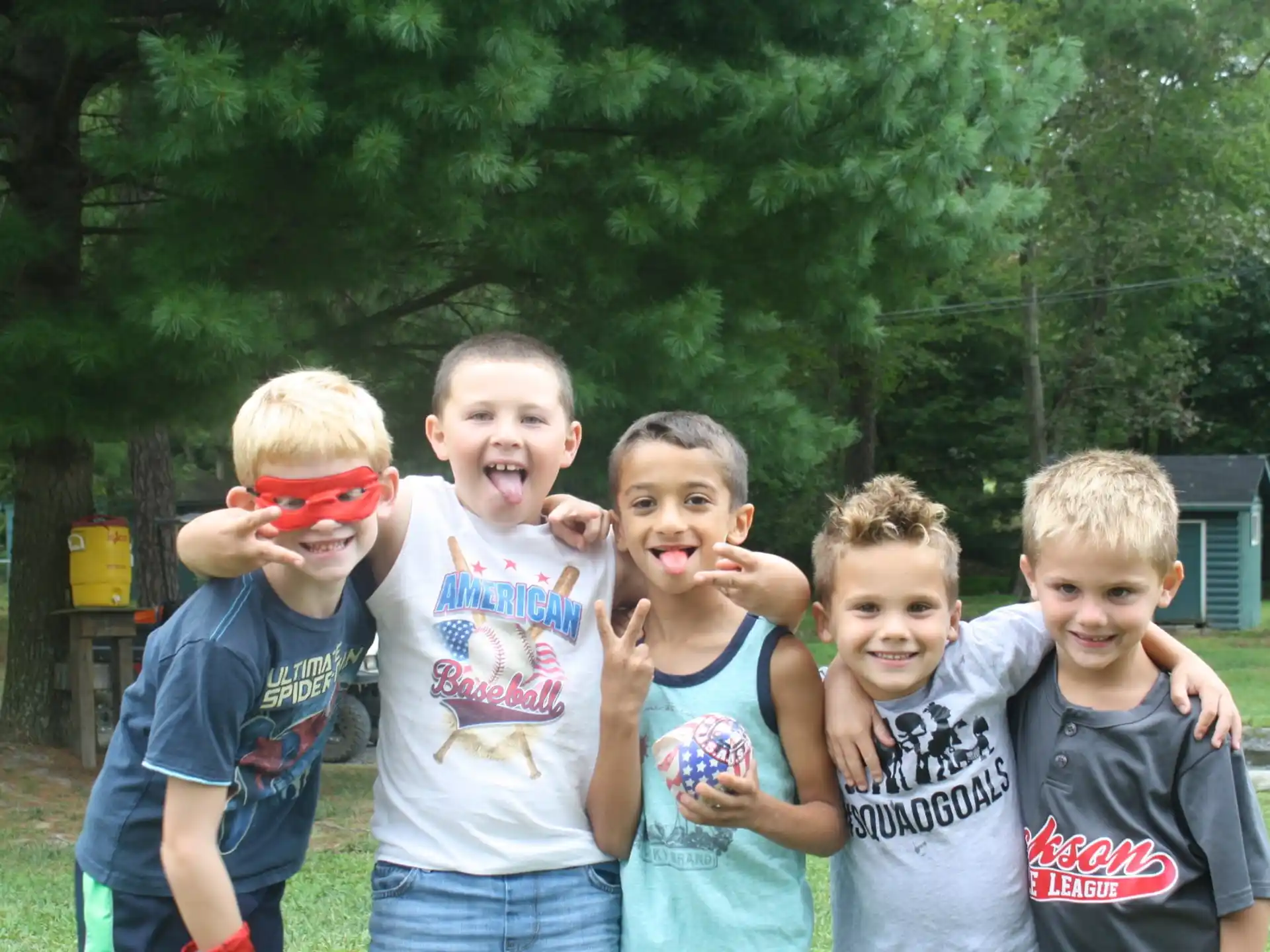 a group of boys posing for a picture