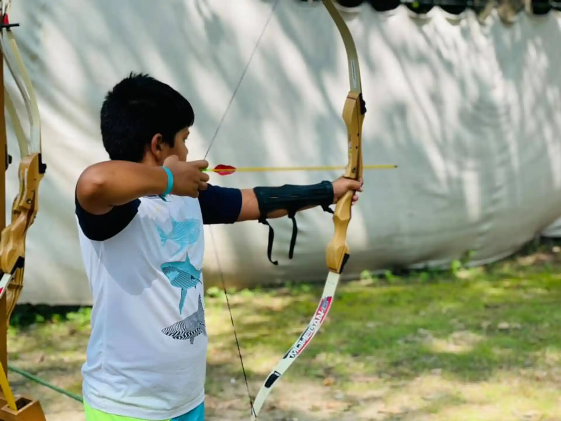 a man shooting a bow