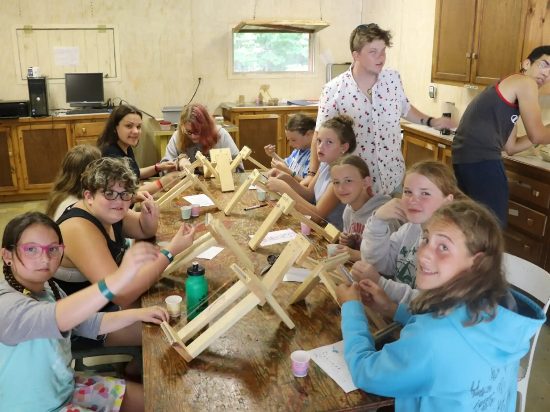 a group of people sitting around a table
