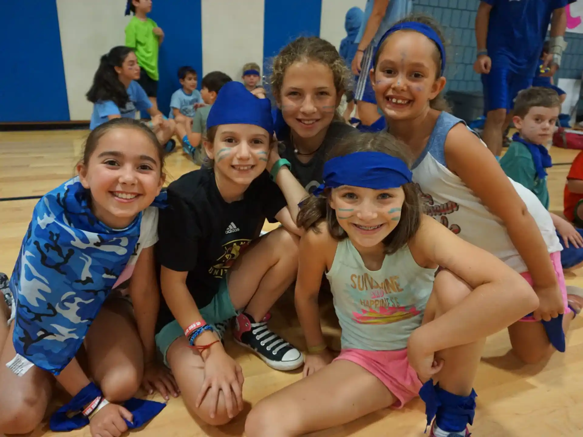 a group of children posing for a photo