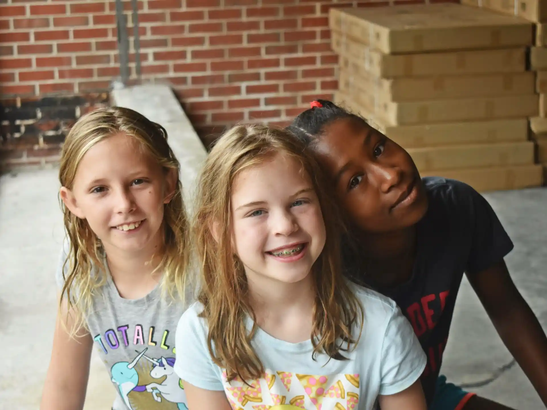 a person and two girls