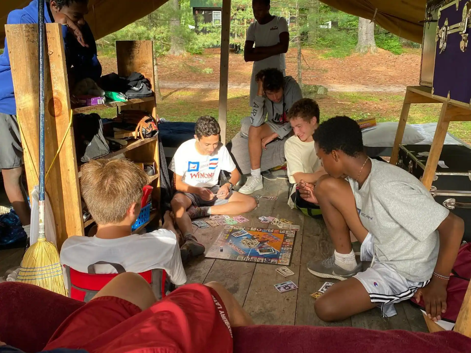 a group of people sitting on the ground