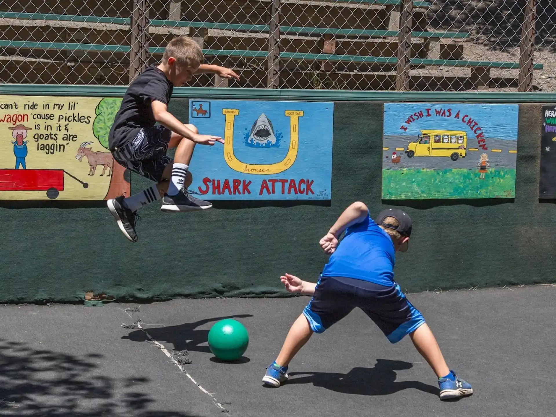 a couple of men playing football