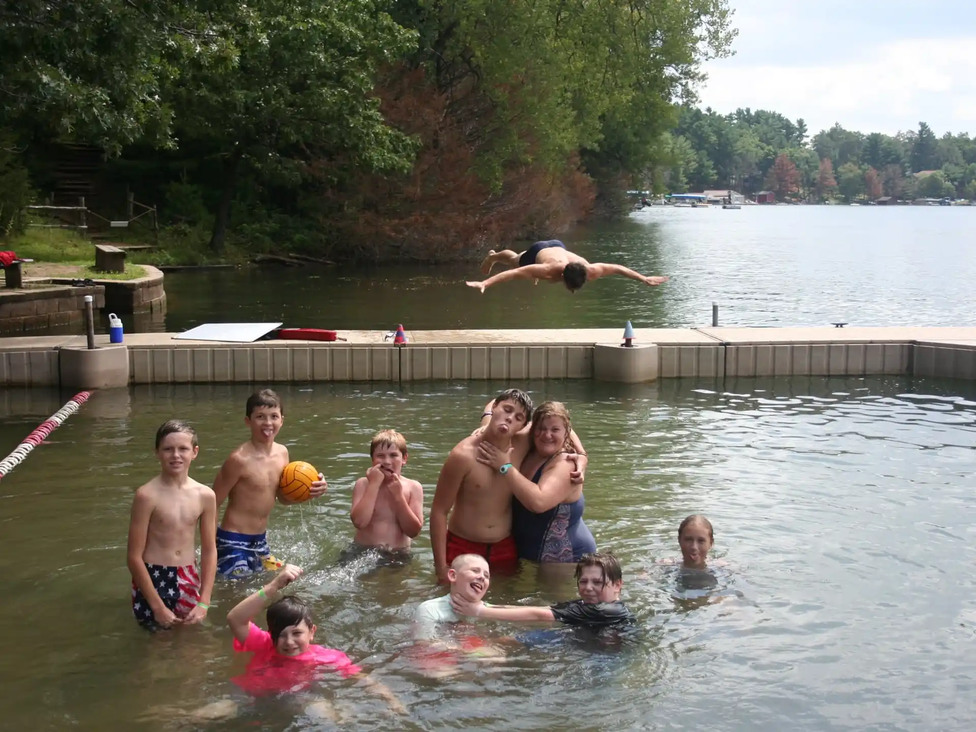 a group of people in a pool