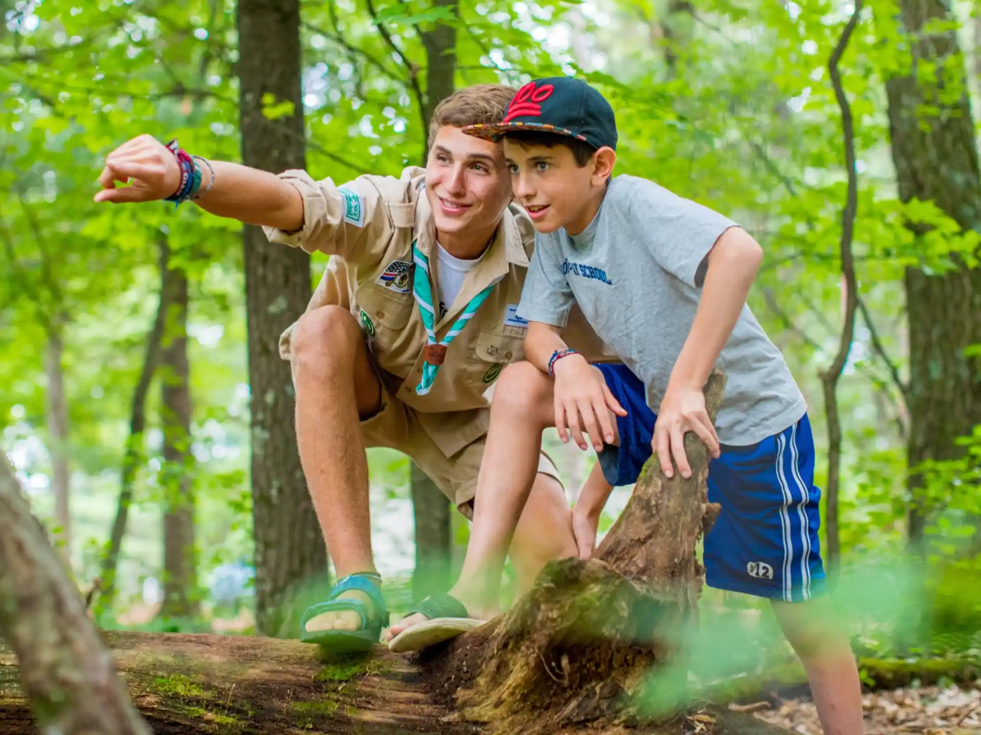 a man and a boy in the woods