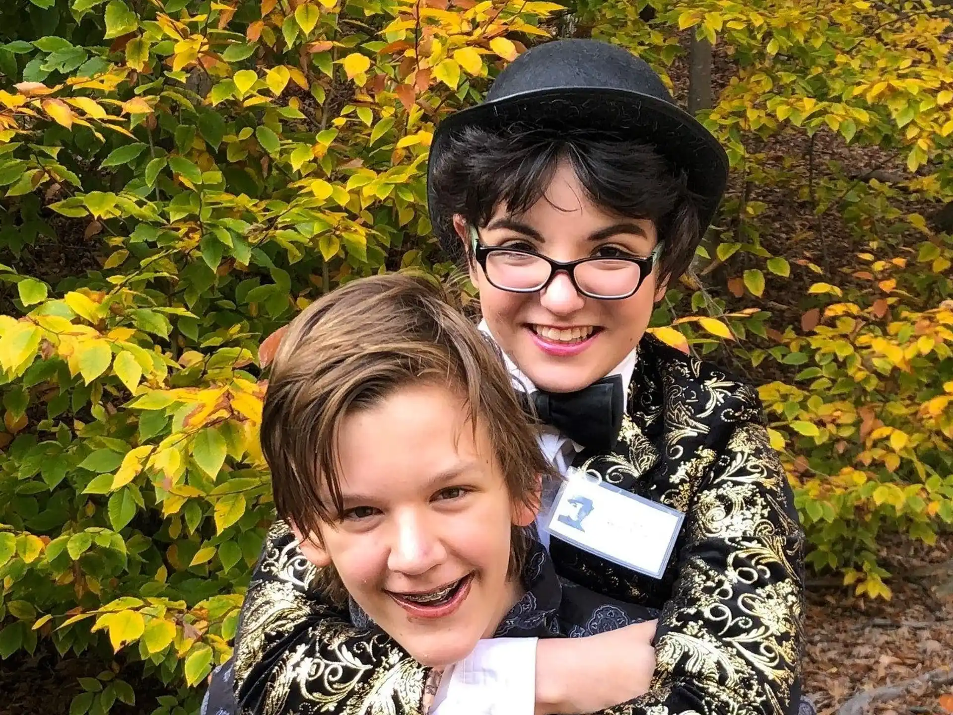 a person and a girl posing for a picture