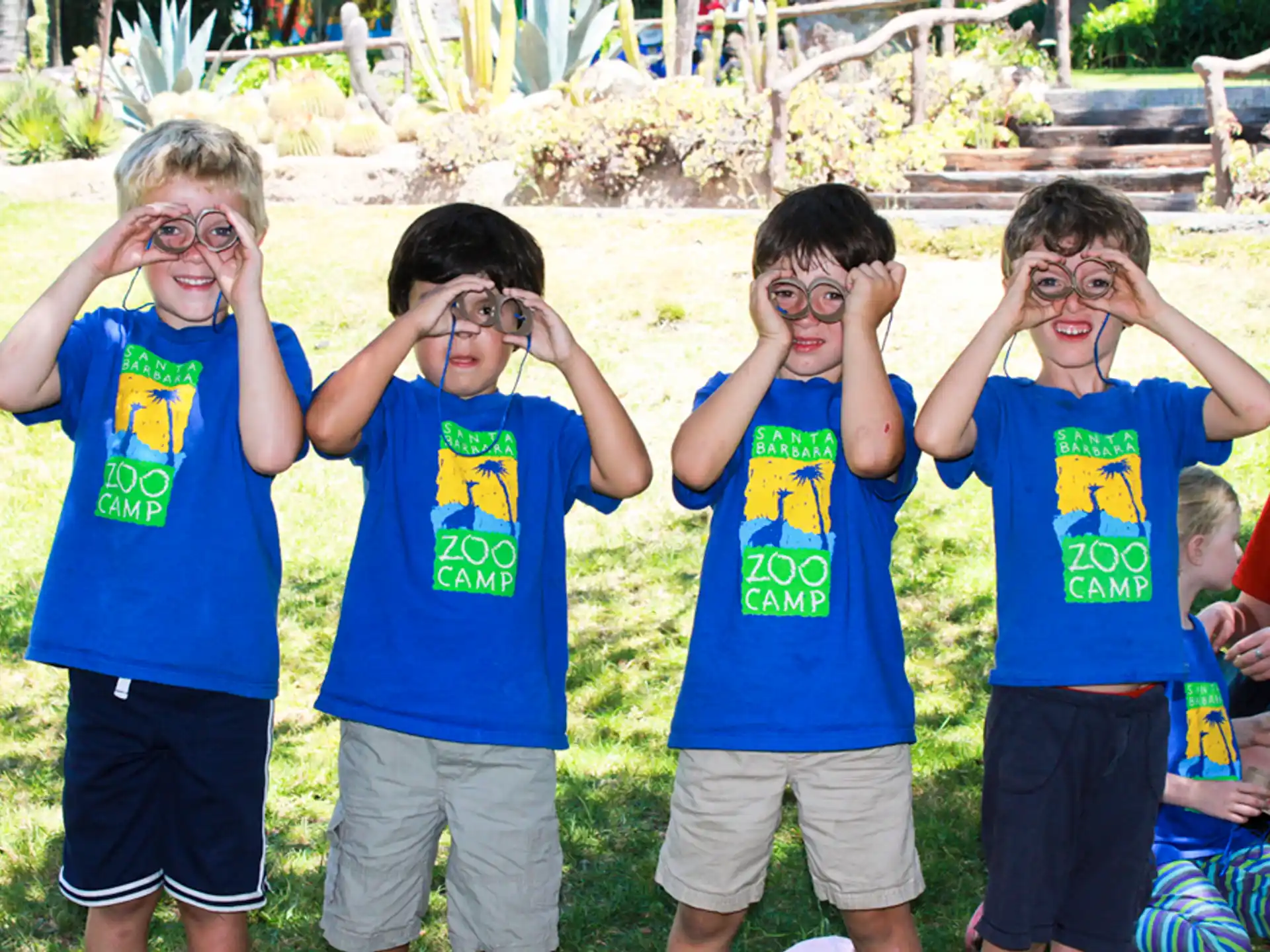 a group of boys wearing face masks