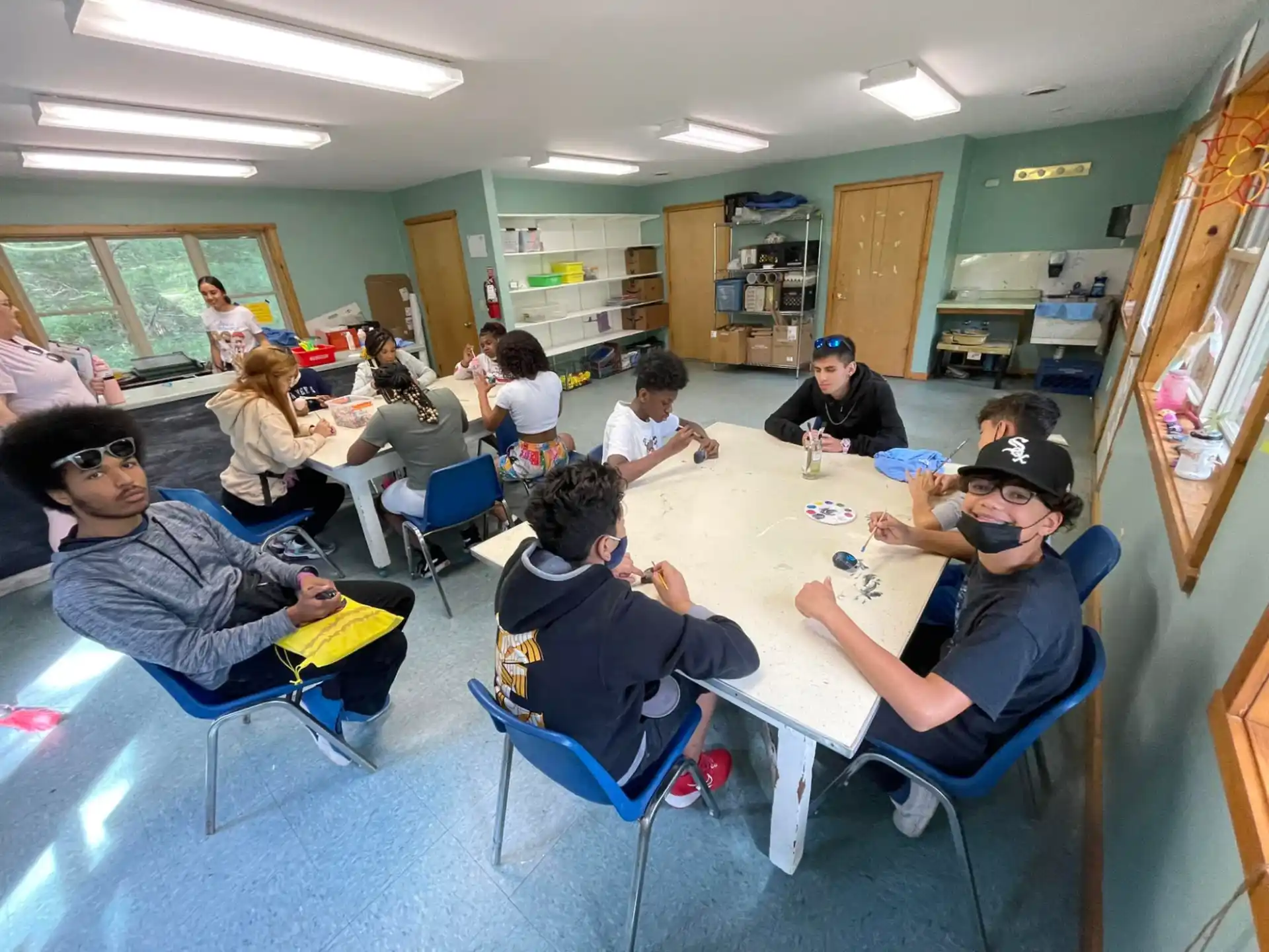 a group of people sitting around a table