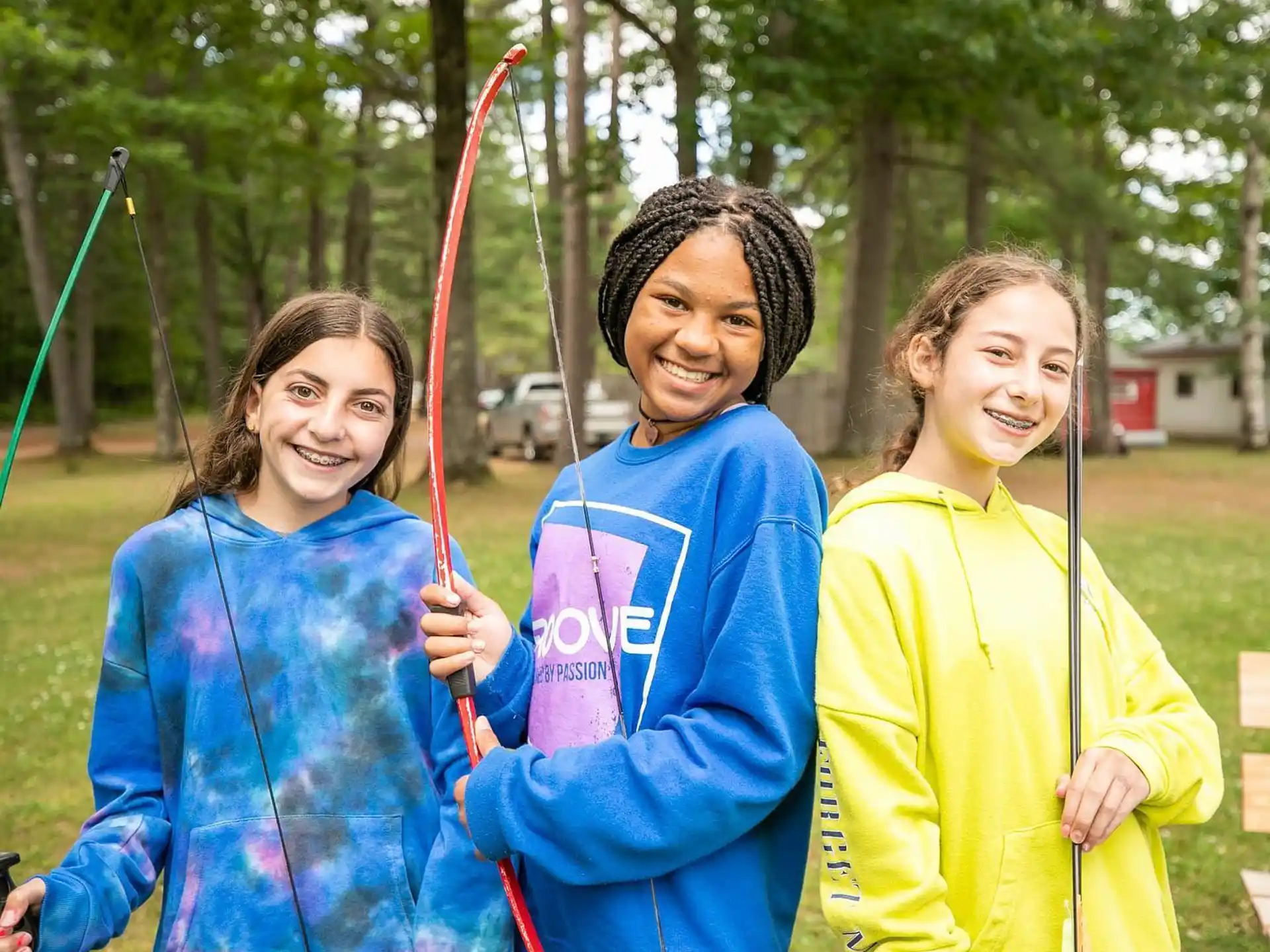 a group of girls on a swing