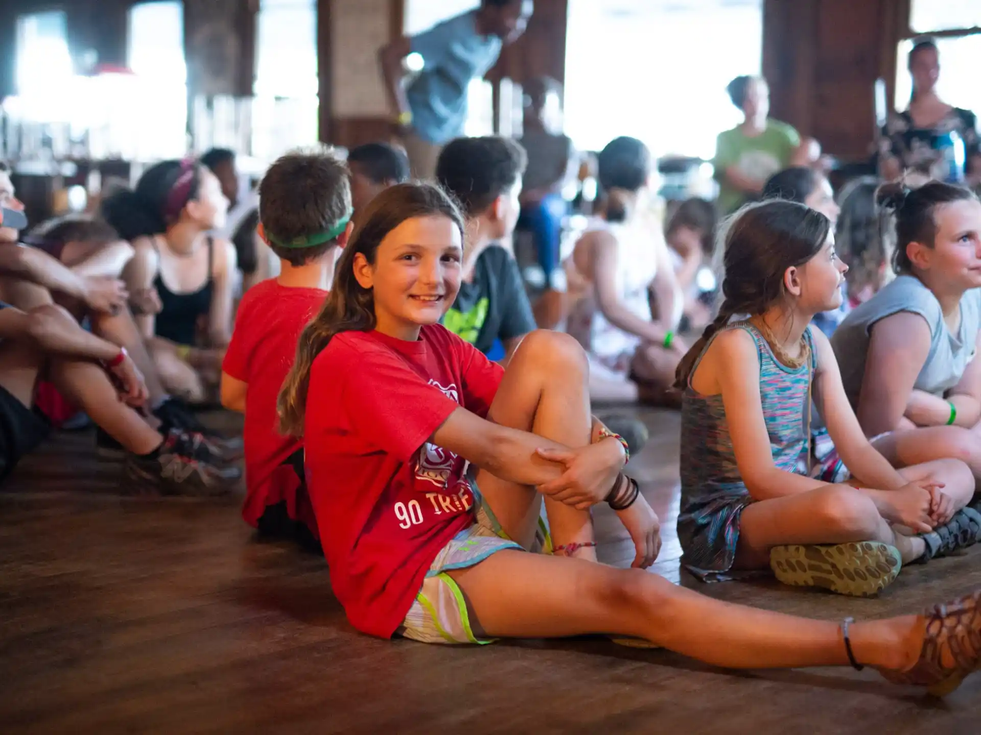 a group of people sitting on the floor