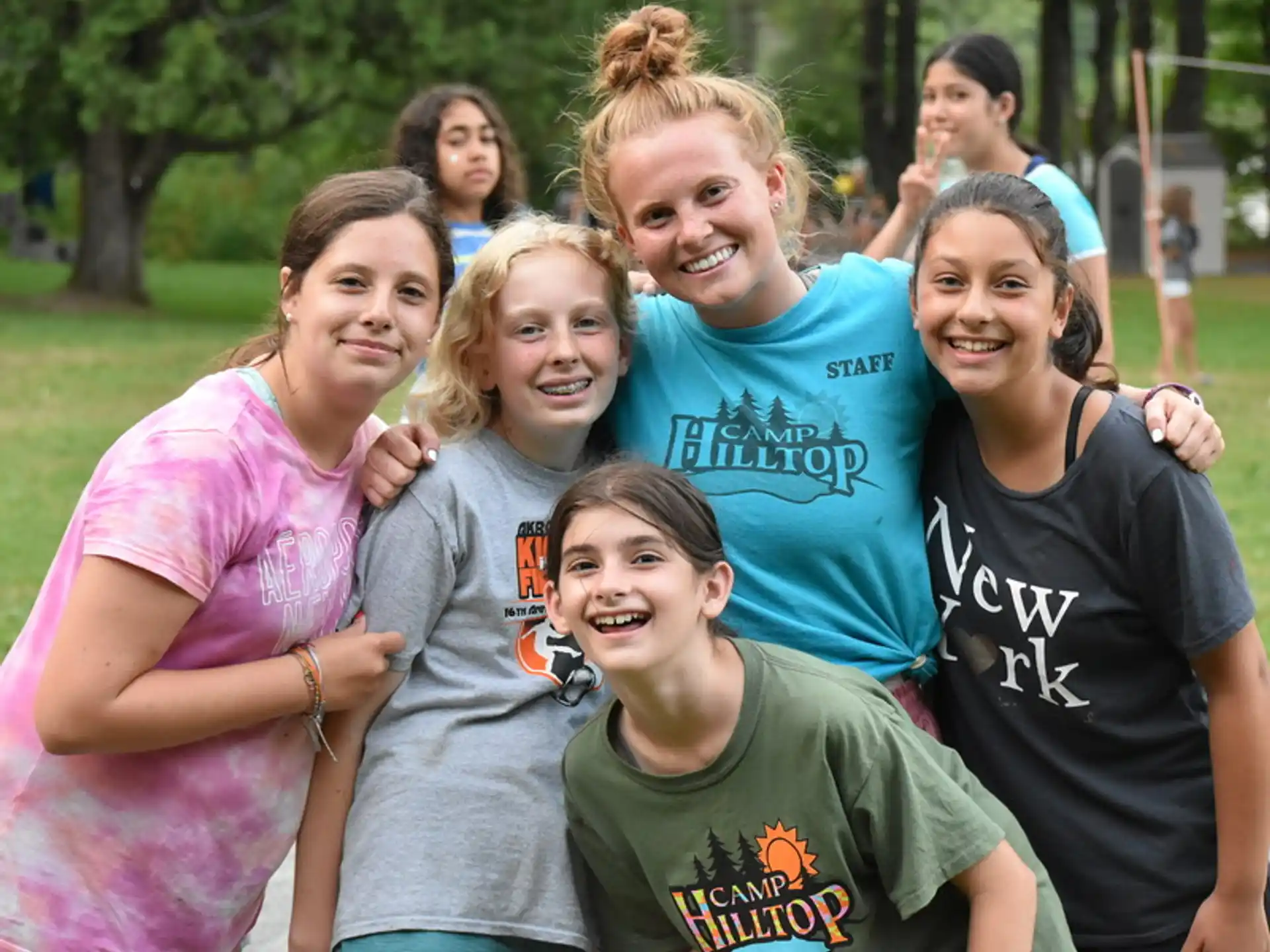 a group of girls posing for a photo