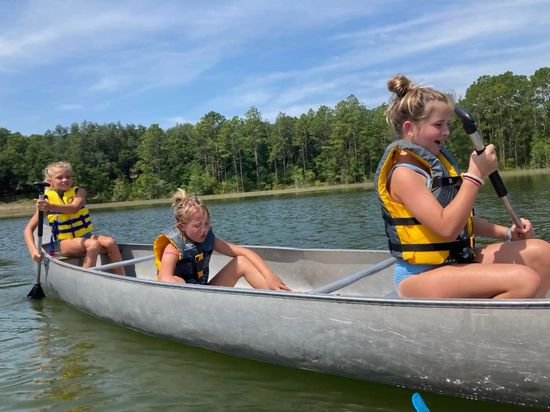 a group of people in a canoe