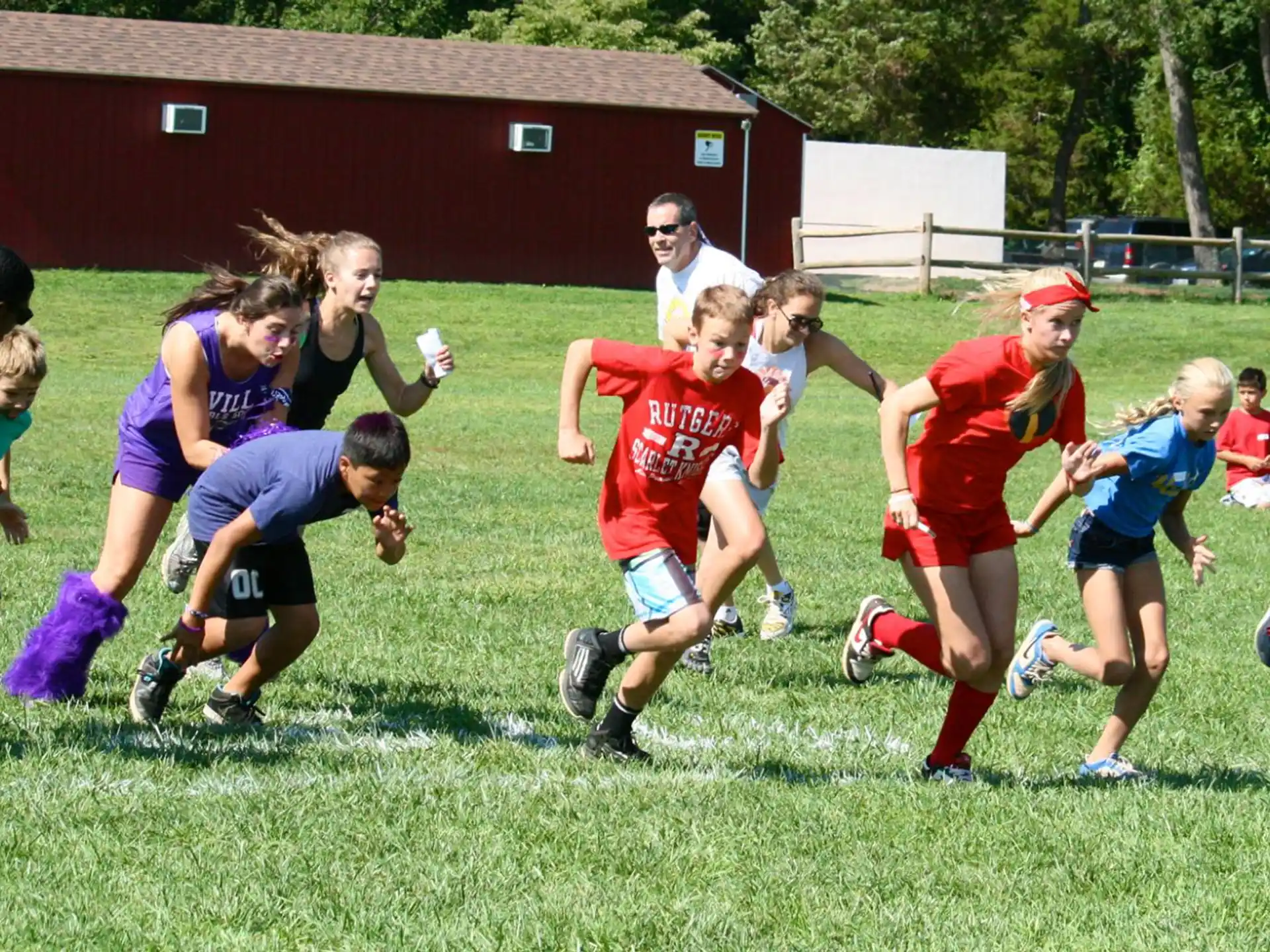a group of people playing rugby