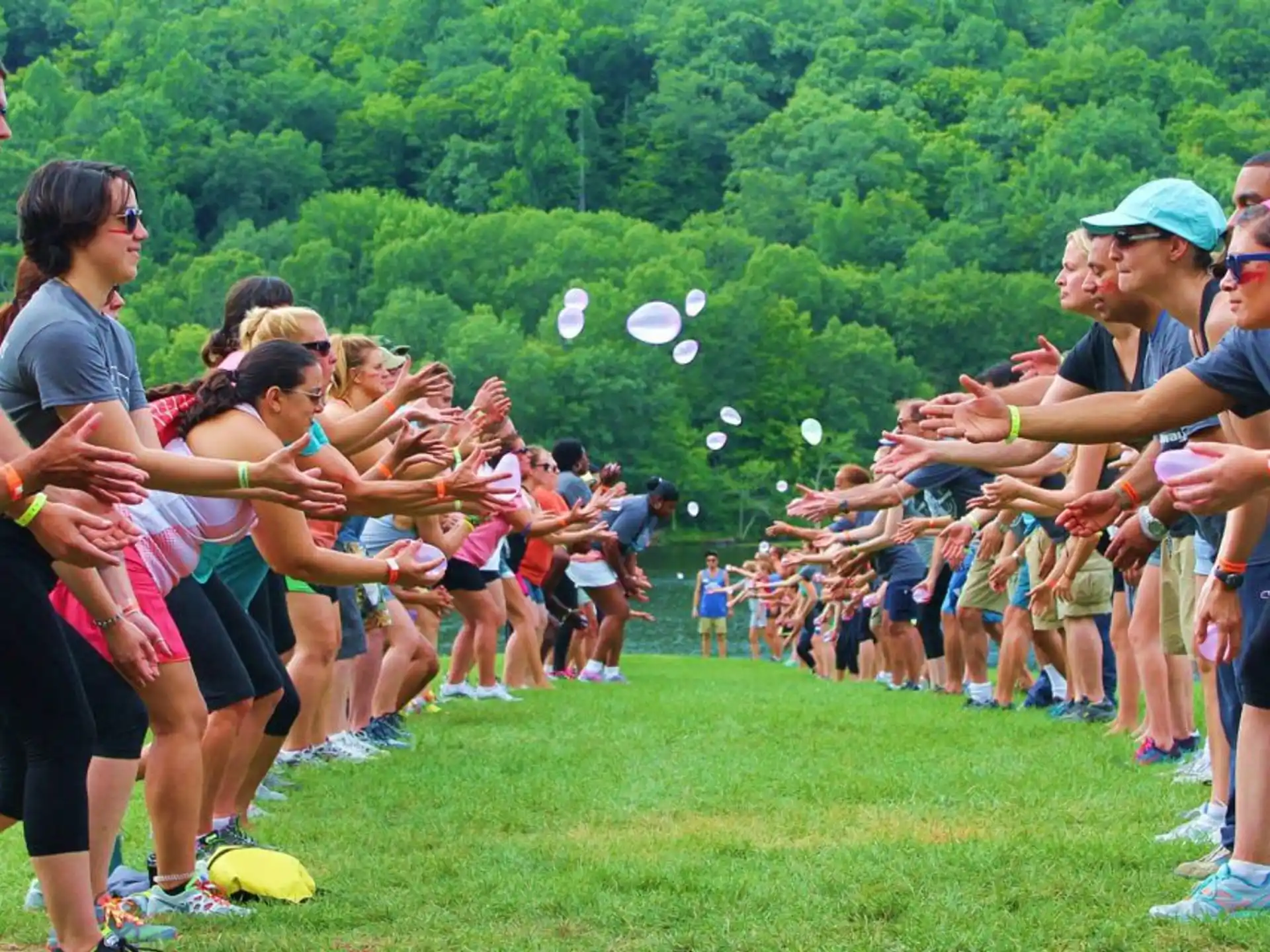 a group of people playing frisbee