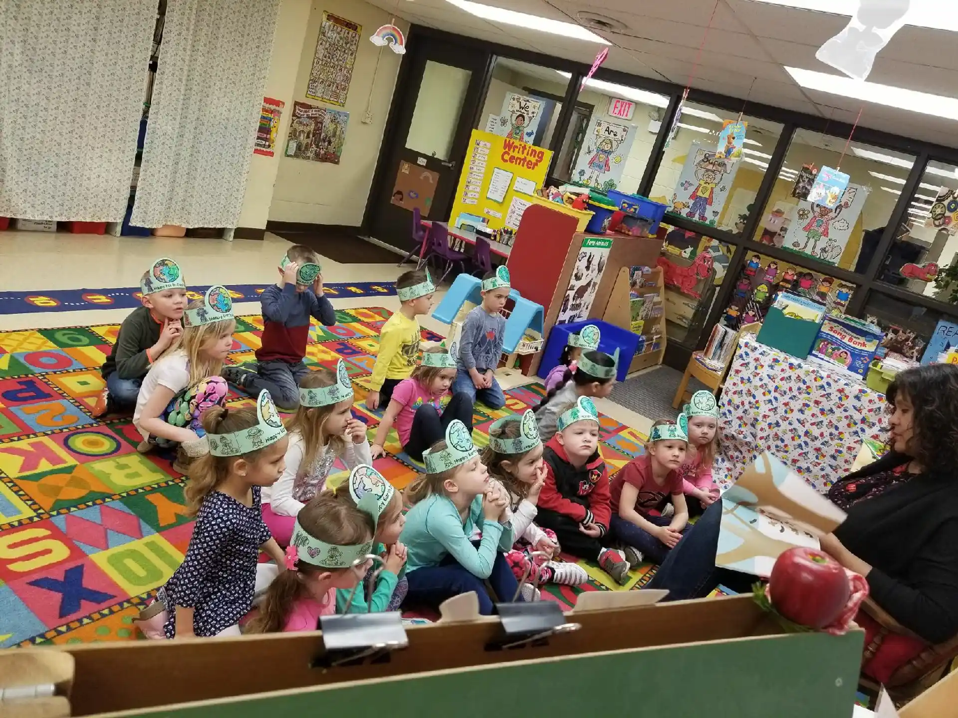 a group of children sitting on the floor