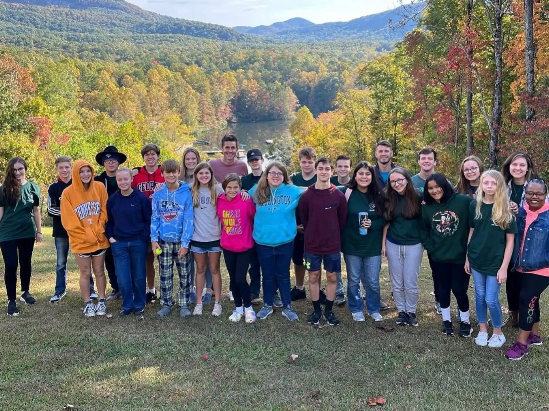 a group of people posing for a photo