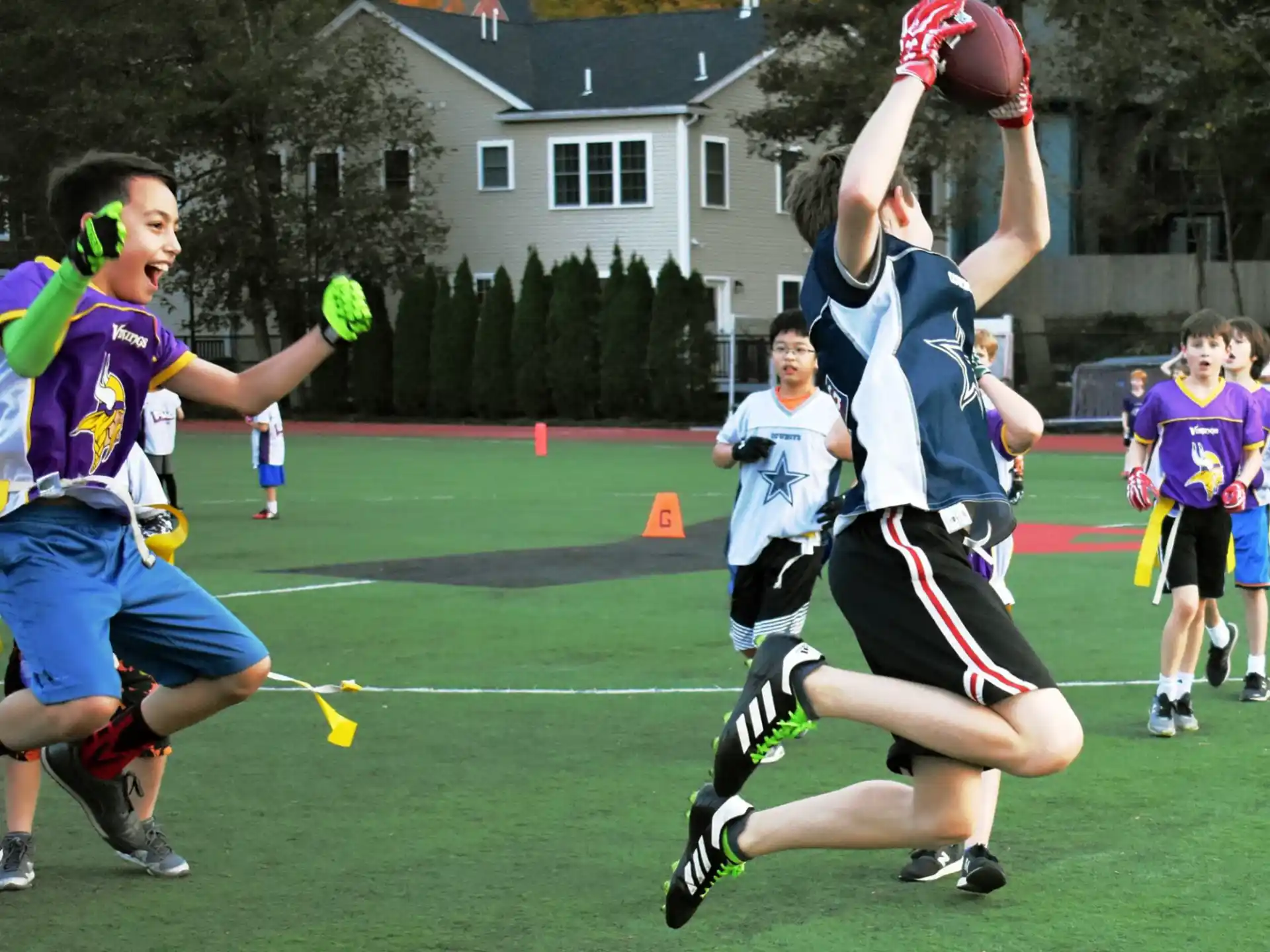 a group of people playing football