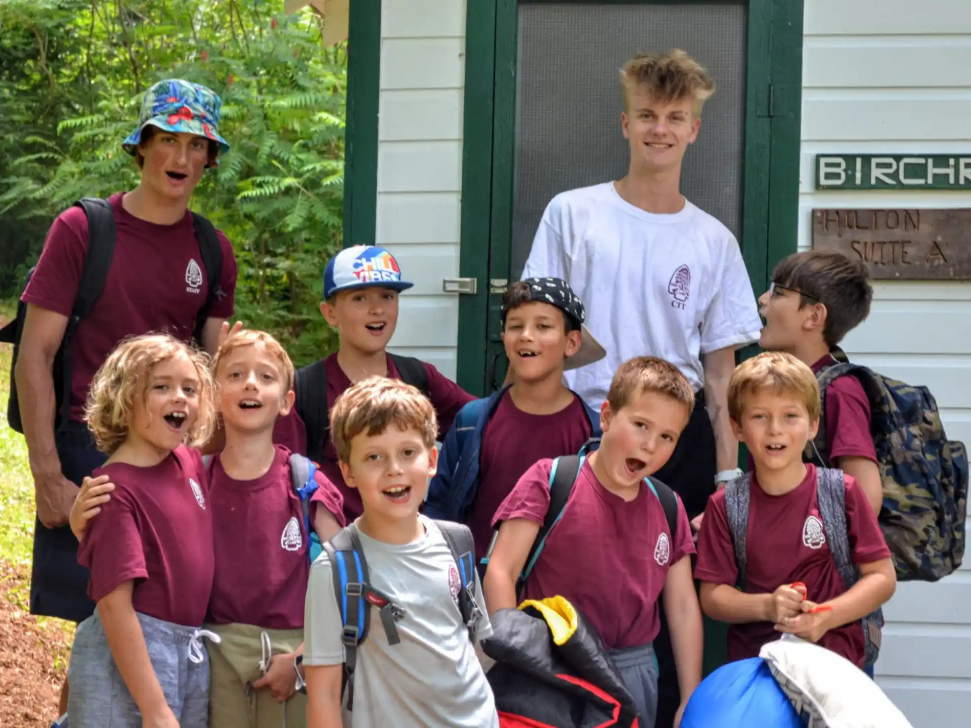 a group of kids posing for a photo