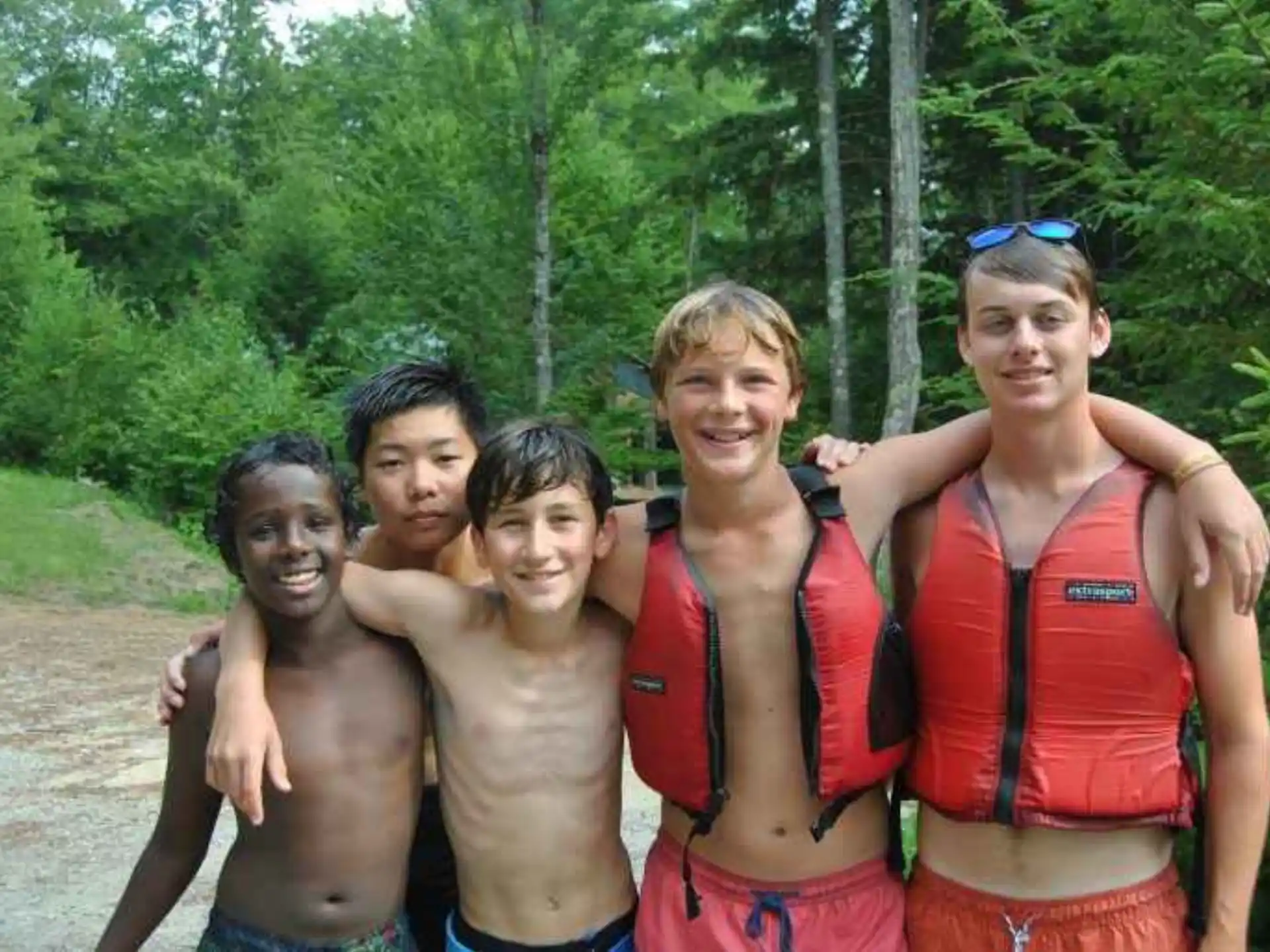 a group of people posing for the camera