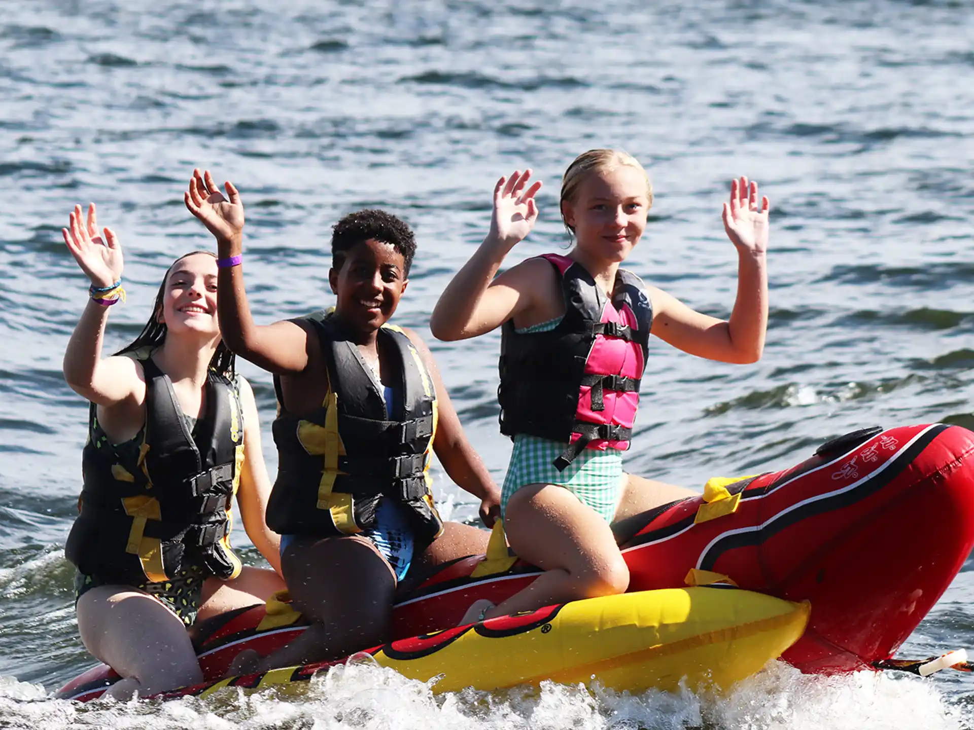 a group of people on a raft