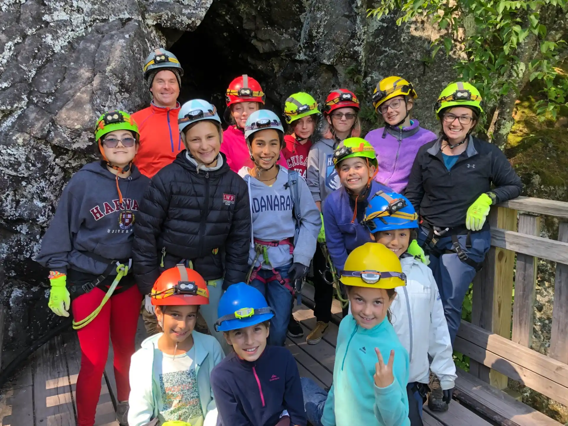 a group of people wearing helmets