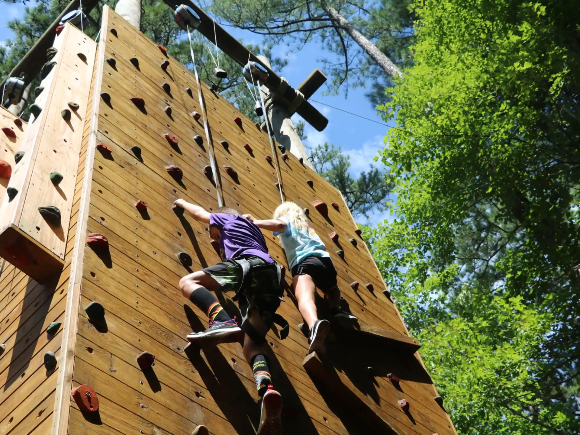 a group of people on a wooden structure