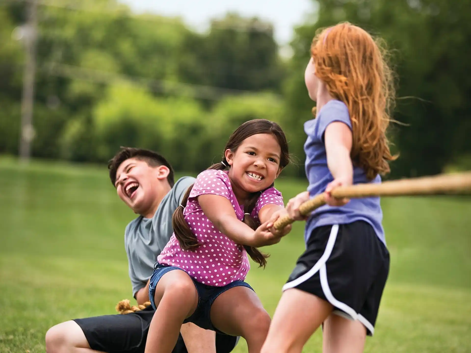a group of people playing baseball