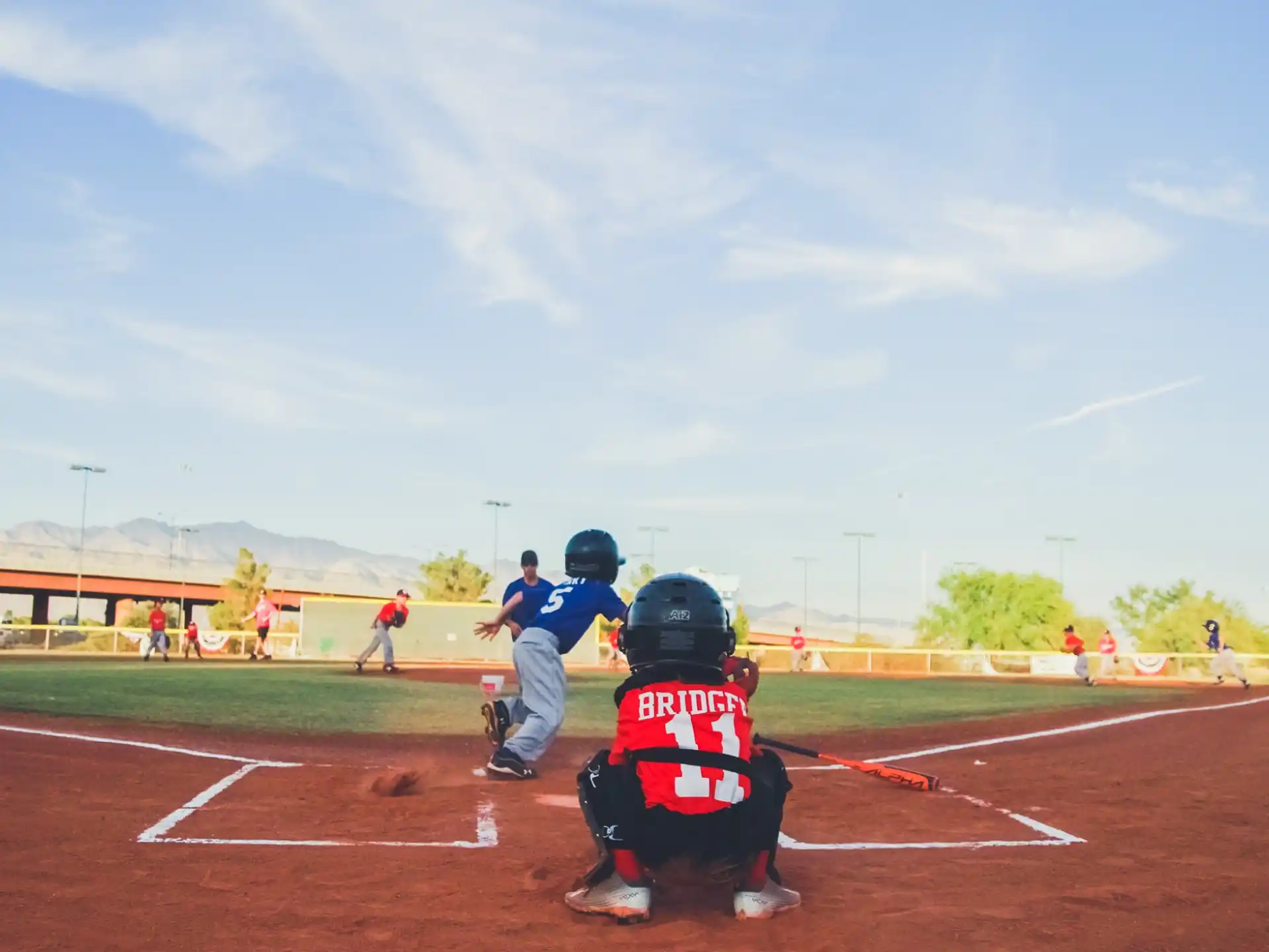 a baseball player prepares to swing a bat